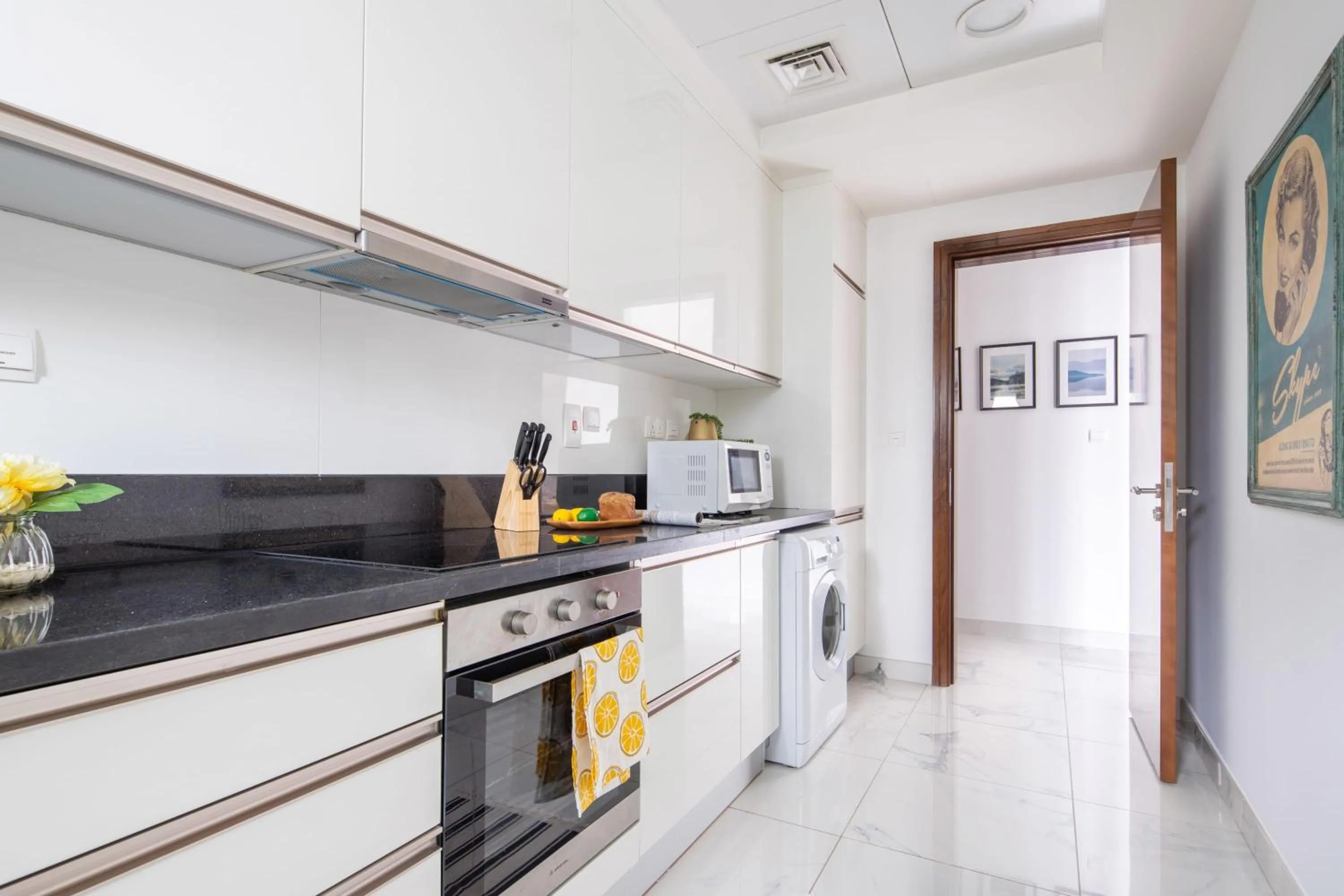 Kitchen or kitchenette in Frank Porter - Noora Tower