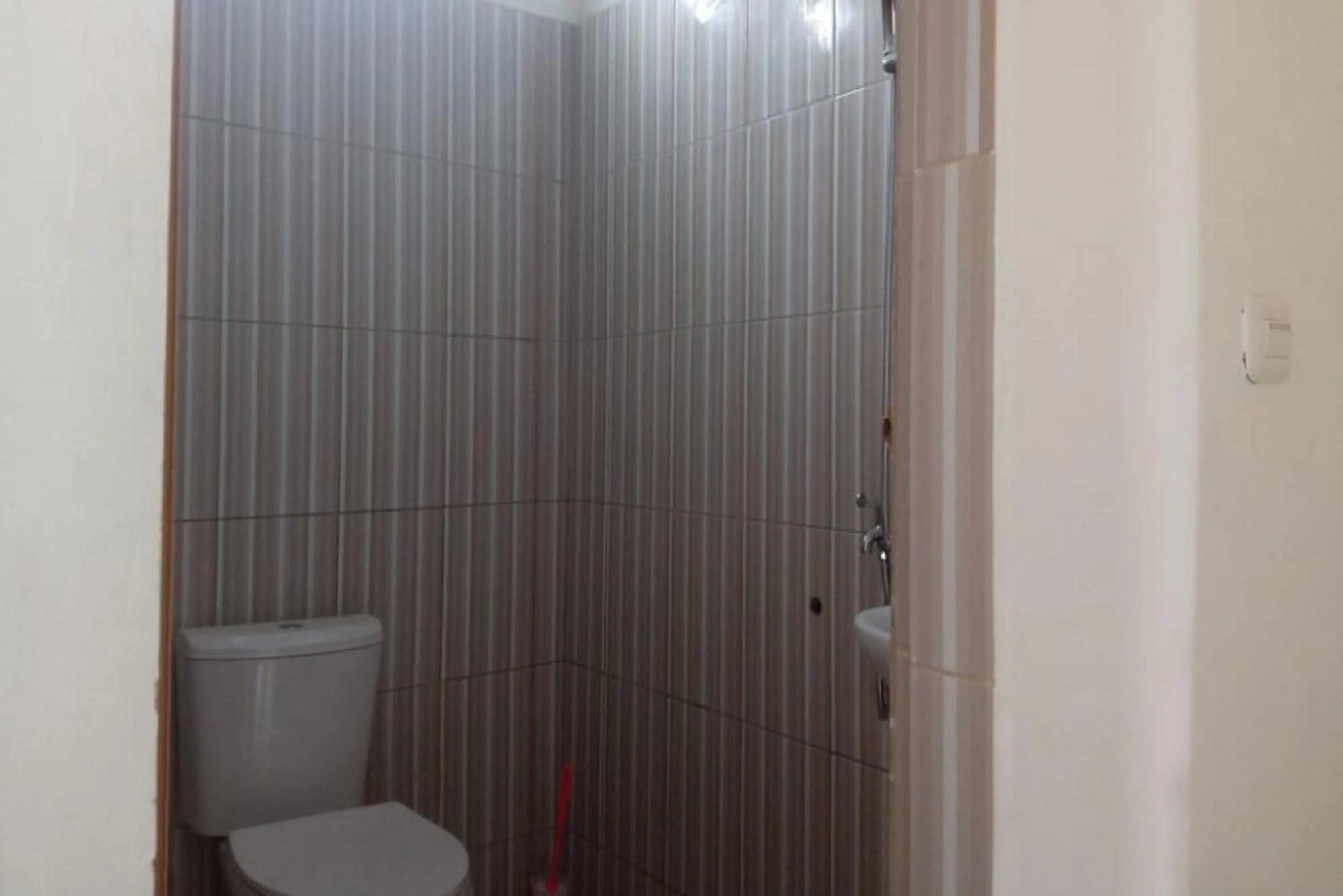 Bathroom in Hotel O Njy House SyariahNearBandara Sultan Syarif Kasim II