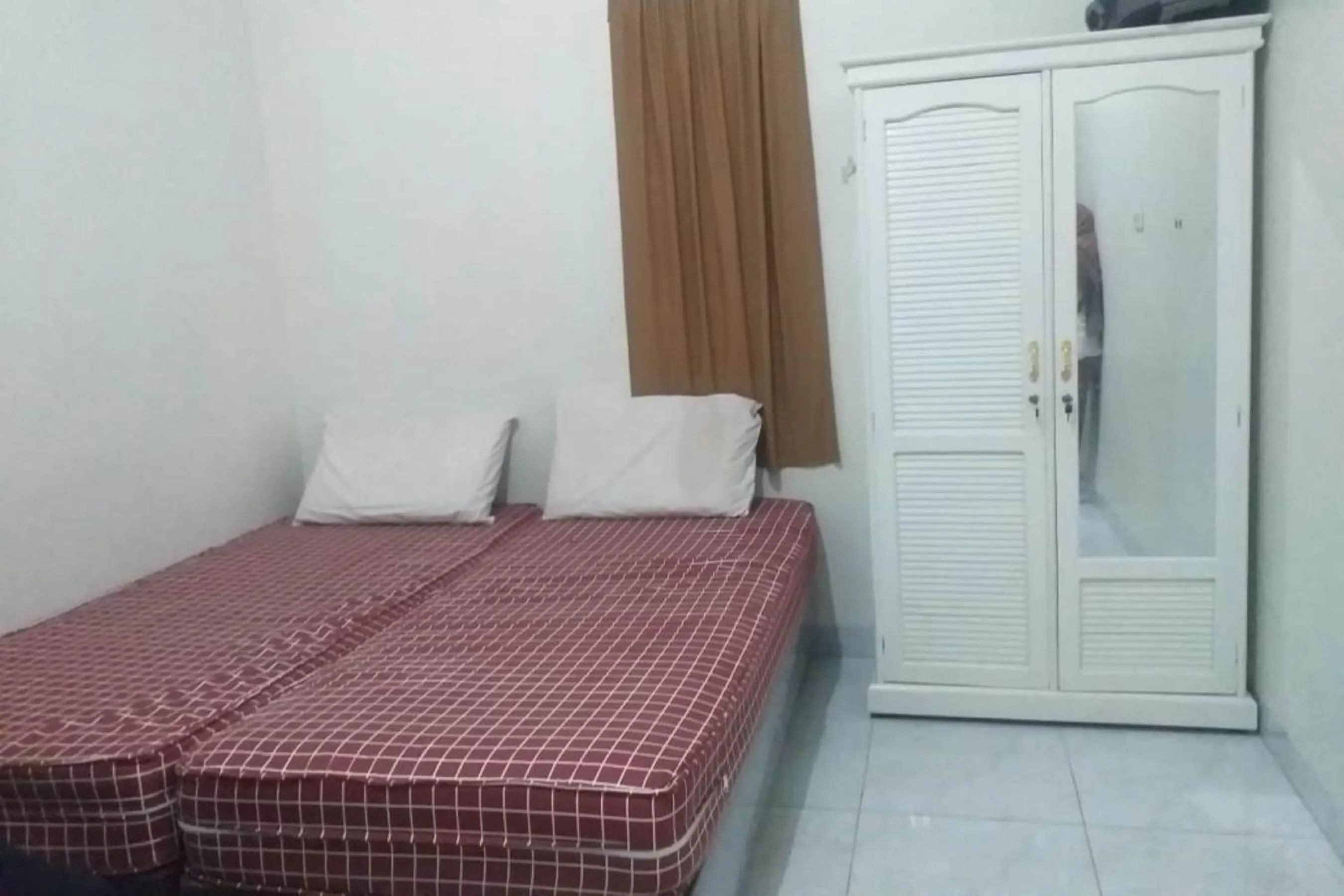 Bedroom, Bed in Hotel O Neva Guest House SyariahNearWaduk Cipta Karya
