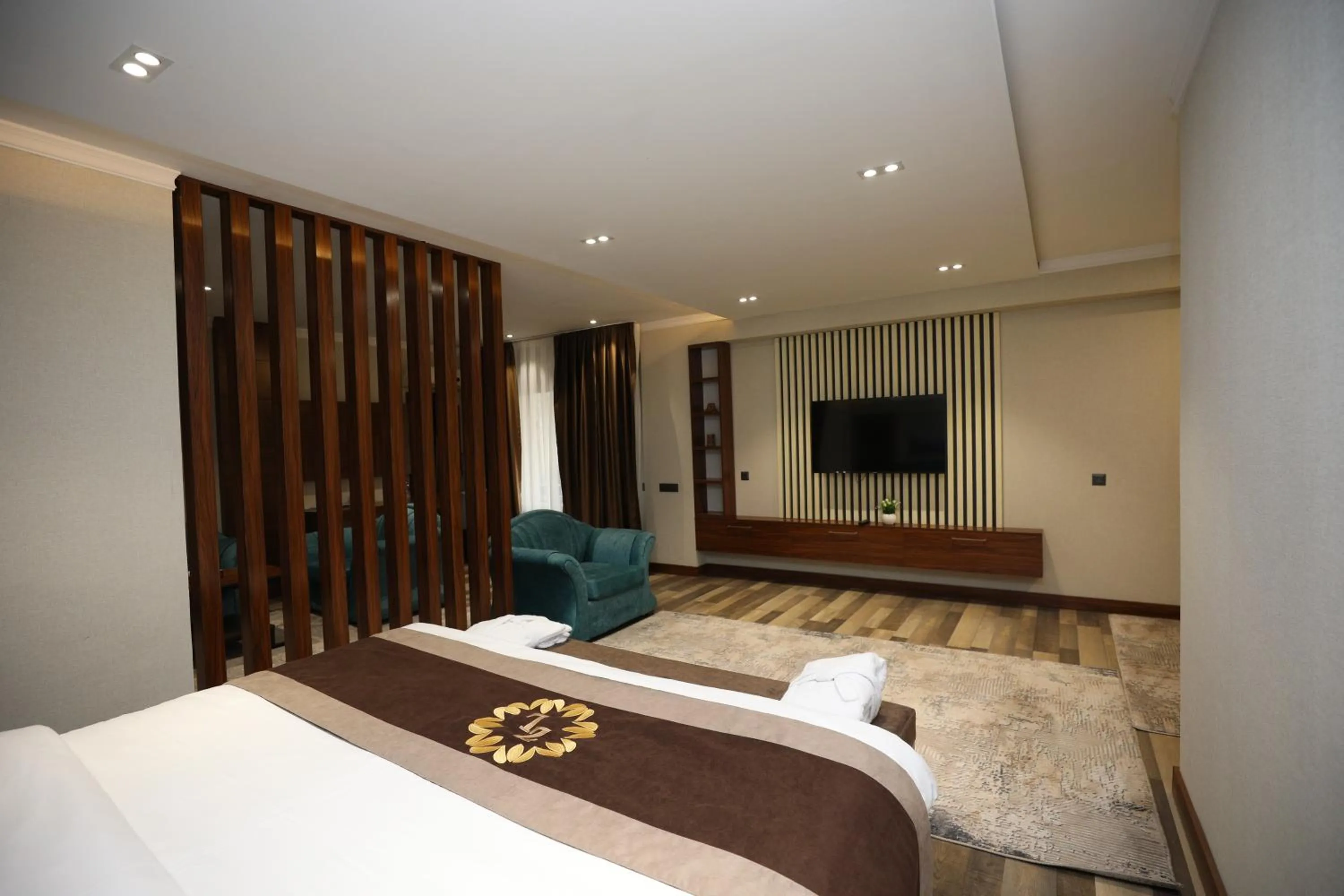 Bed in Ziyorat Luxury Hotel