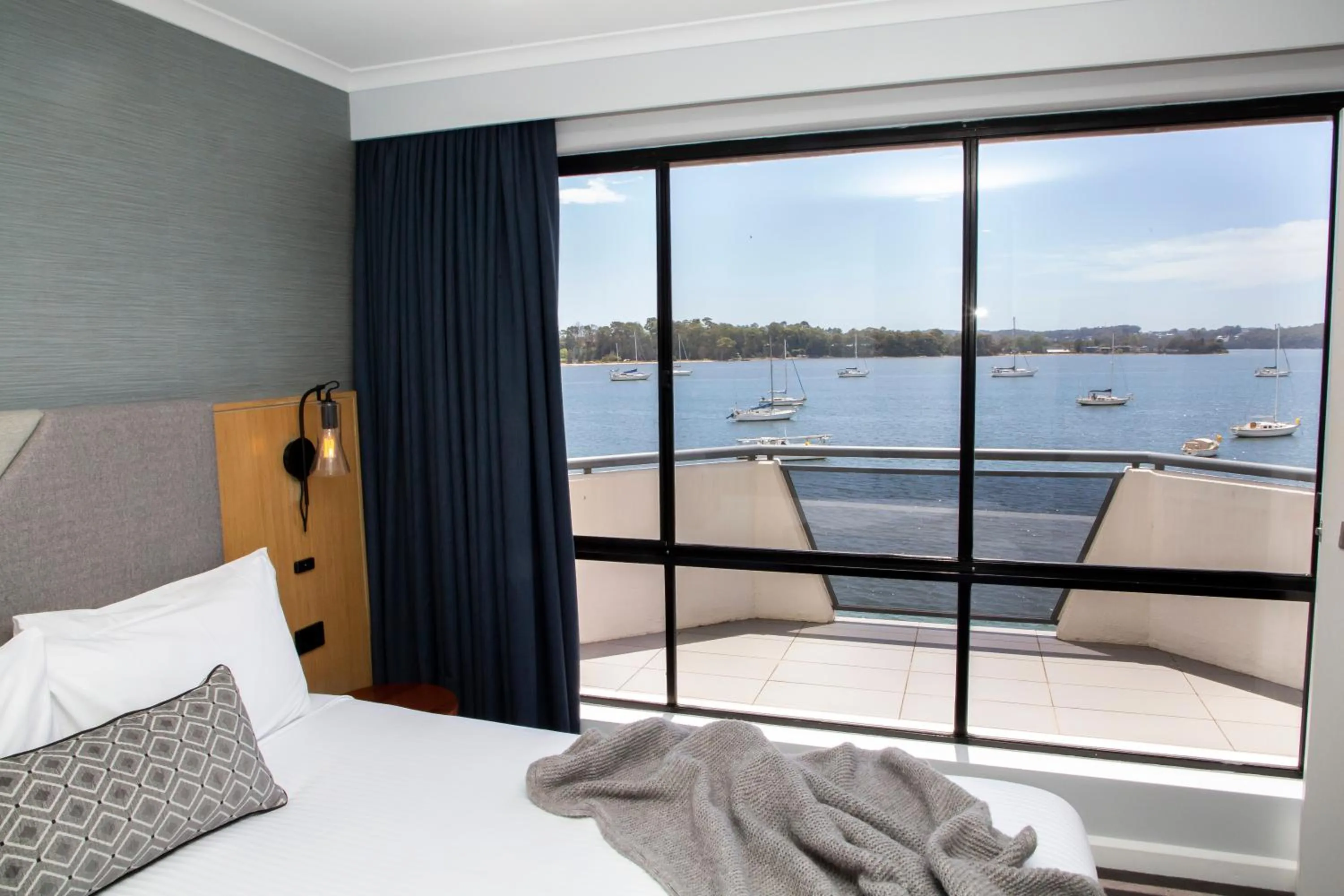 Bed in The Esplanade Motel