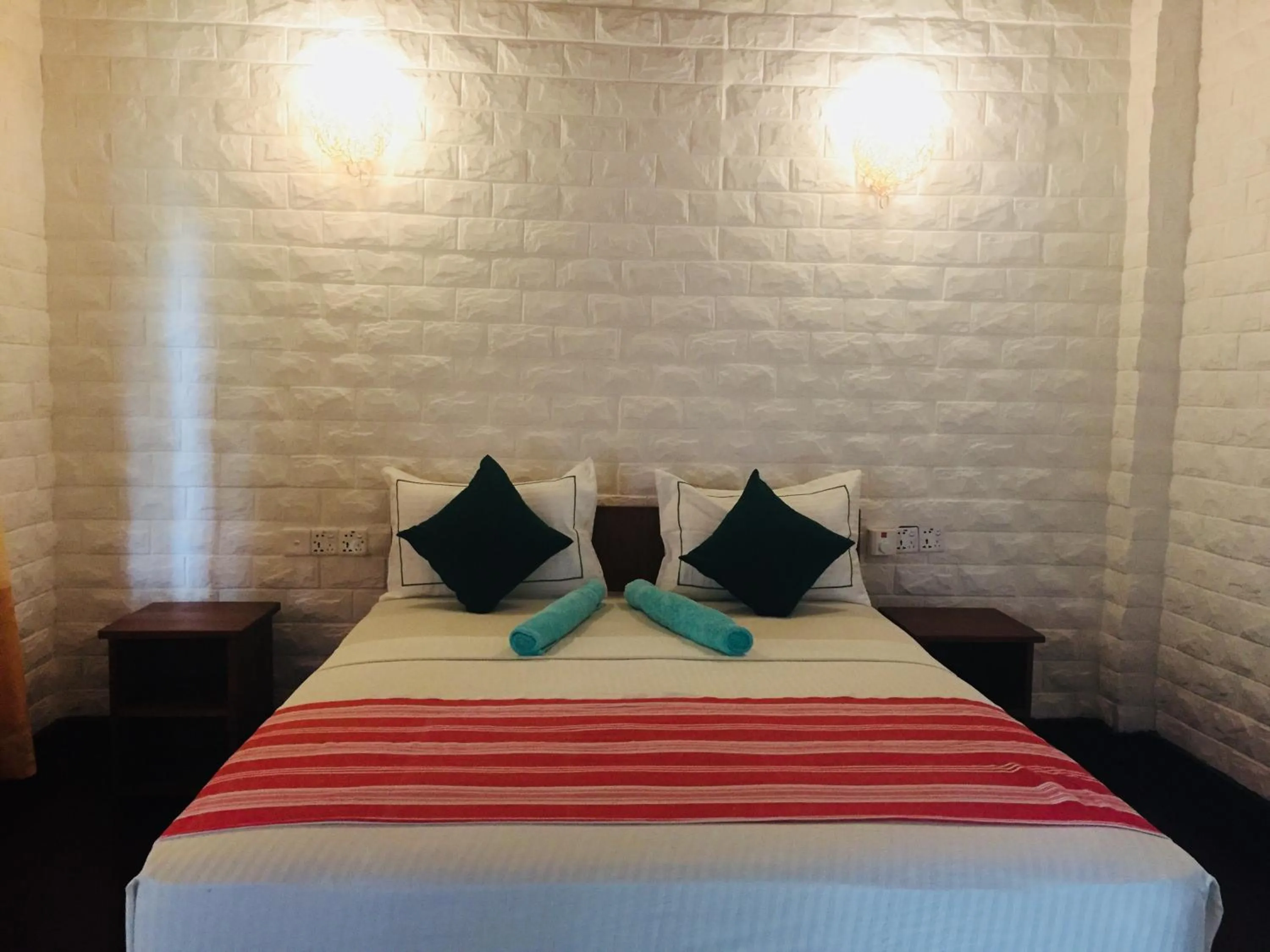 Bed in Liyon Rest sigiriya