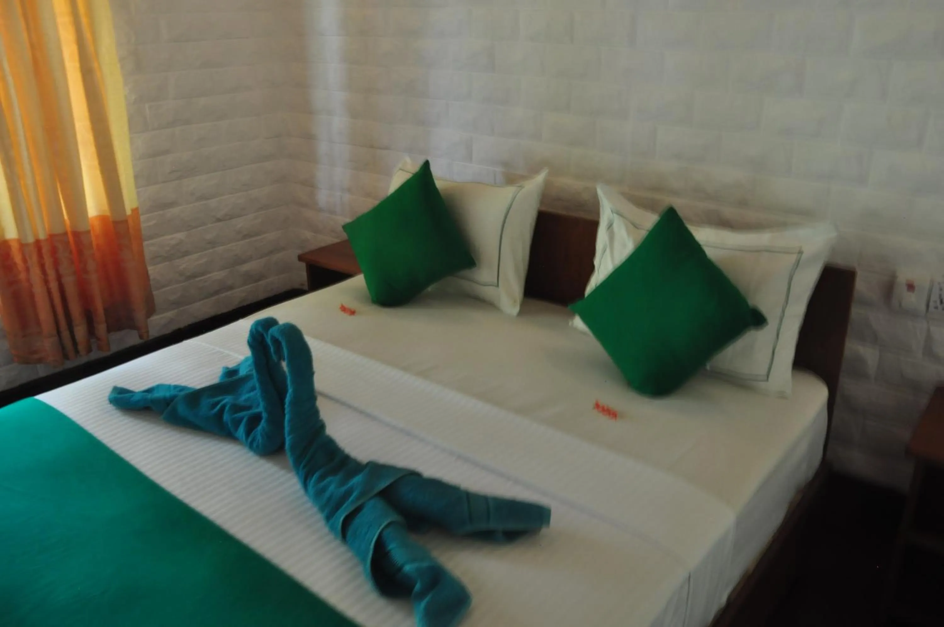 Bed in Liyon Rest sigiriya