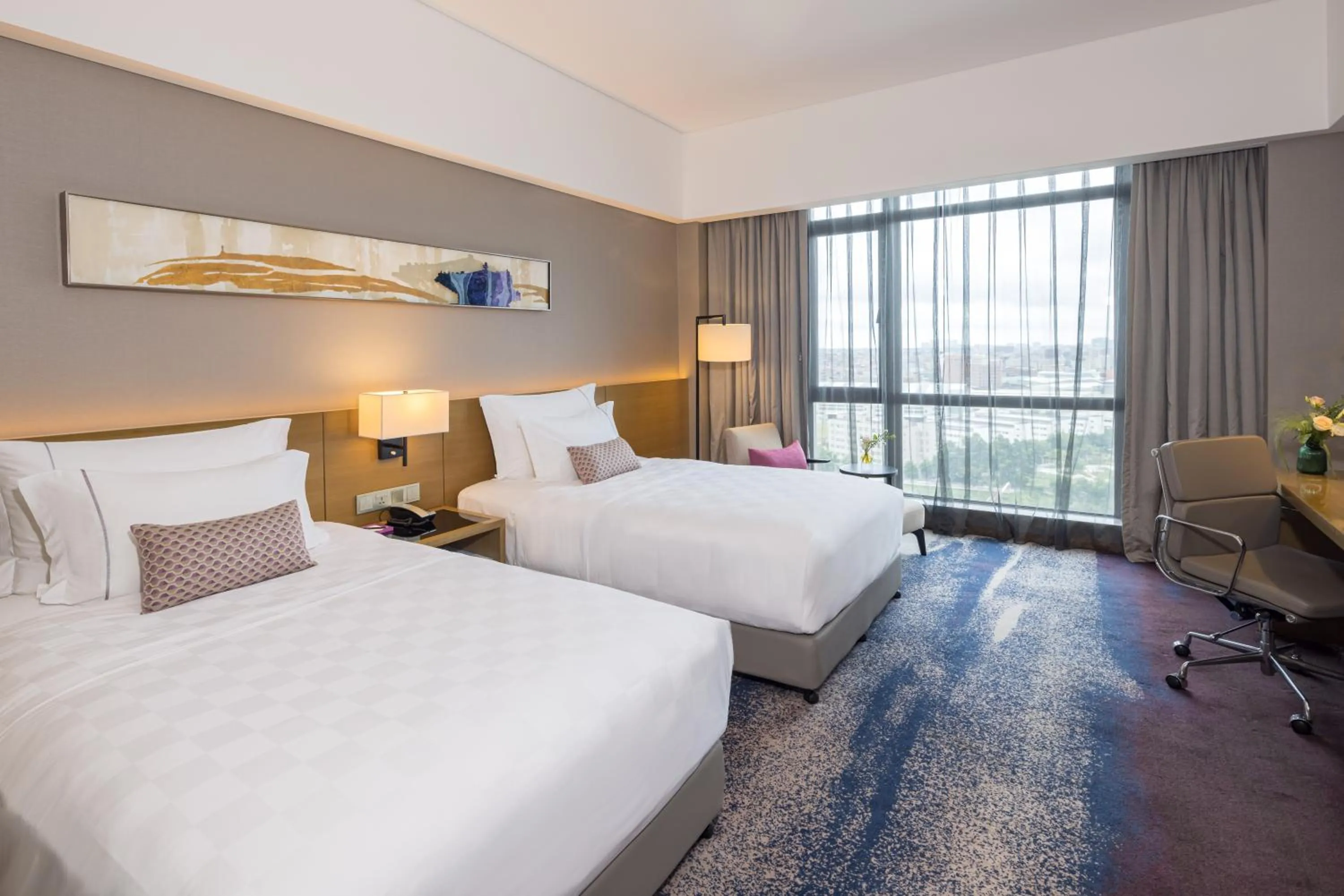 Bed in Wyndham JinJiang Hotel