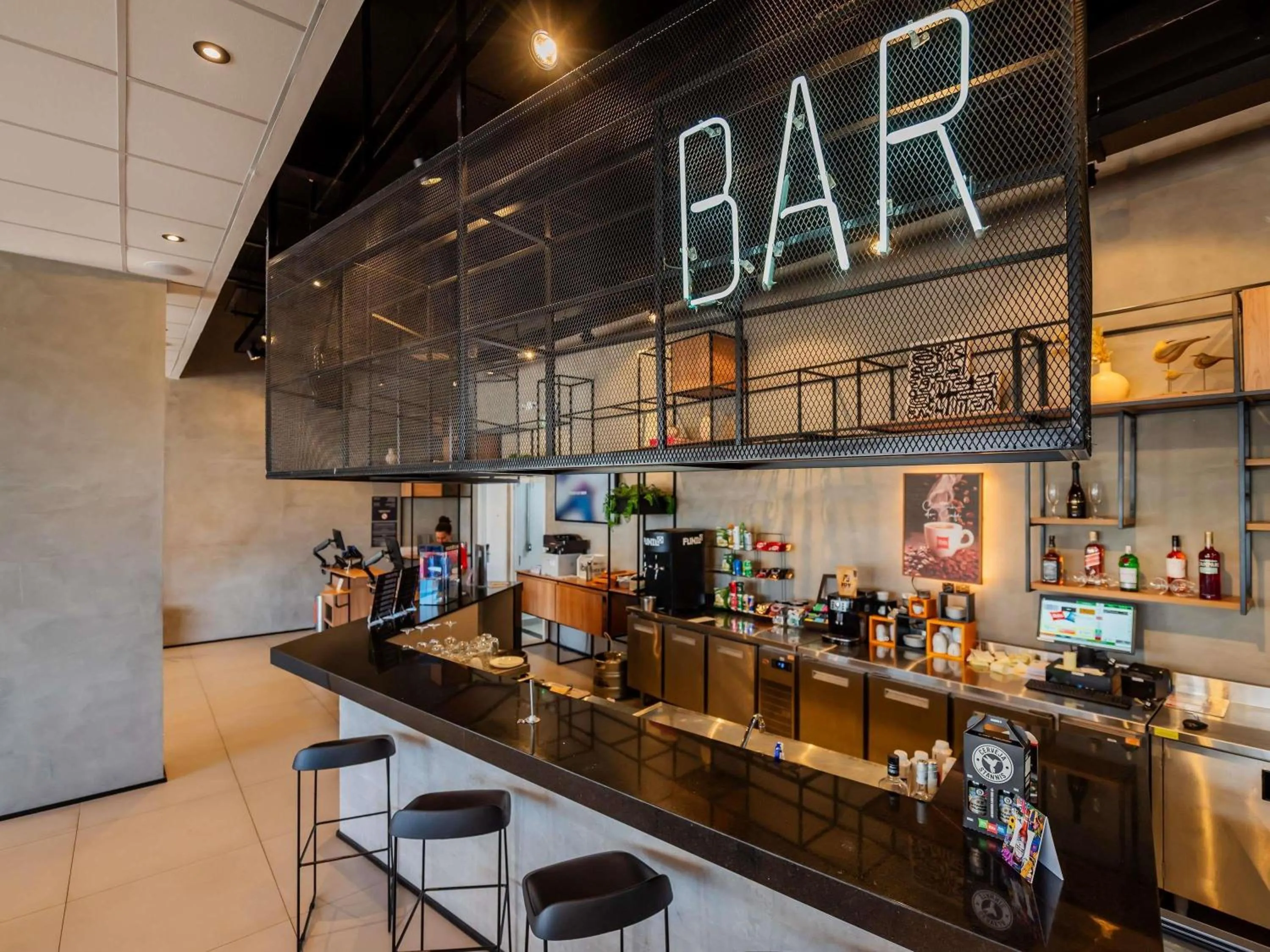 Lounge or bar in ibis Lavras