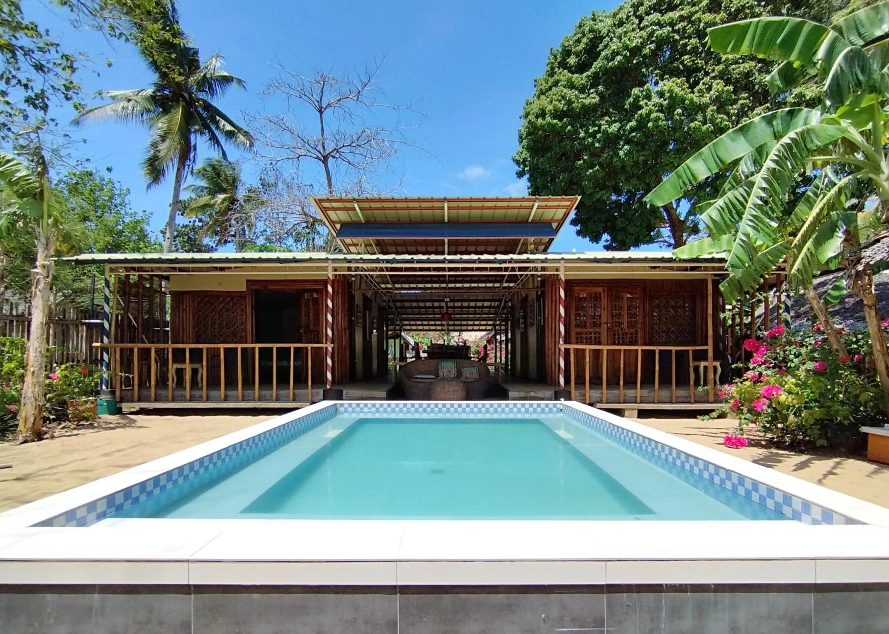 Swimming pool in The Clara Beach and Guest House