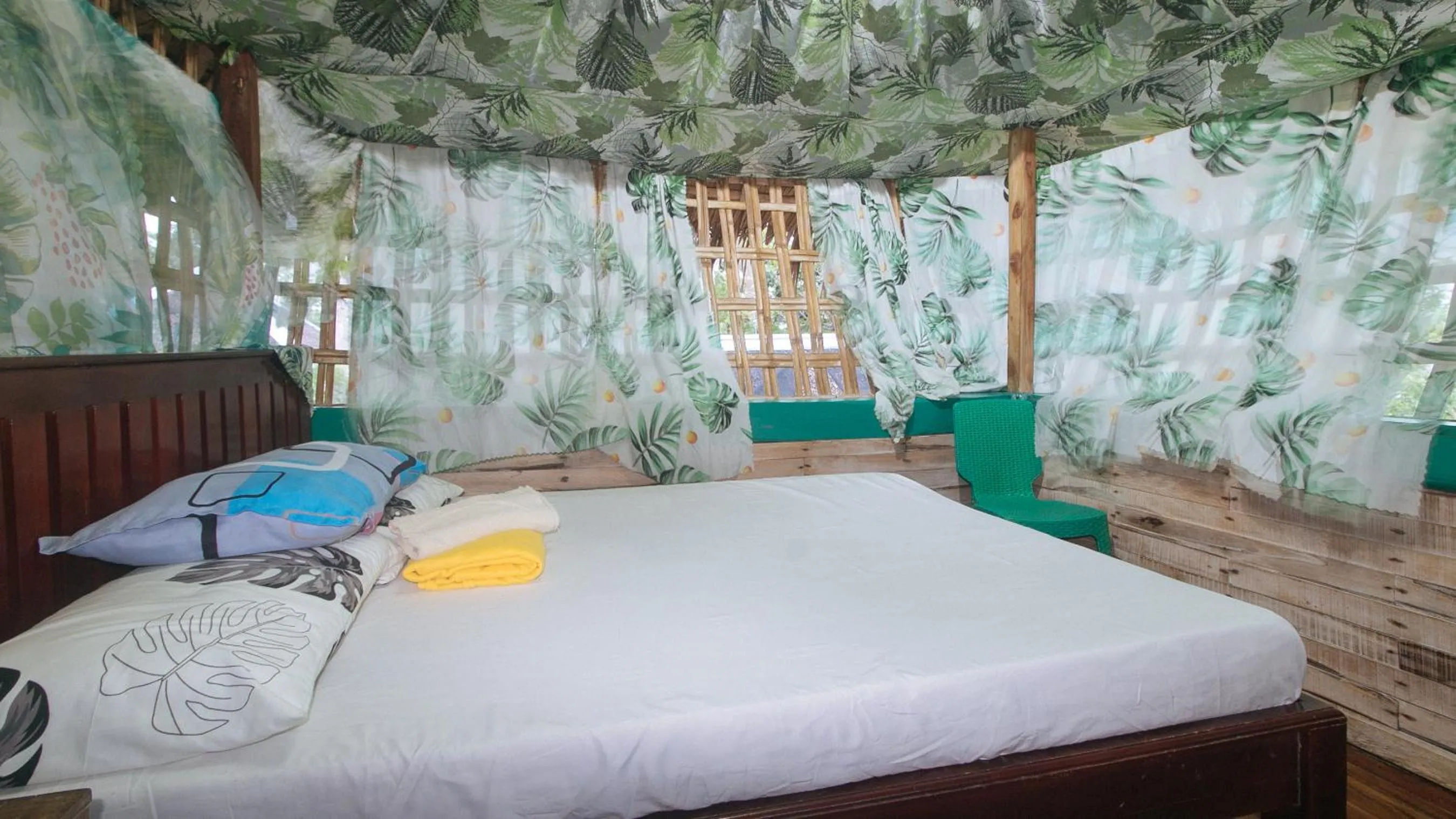 Bed in The Clara Beach and Guest House