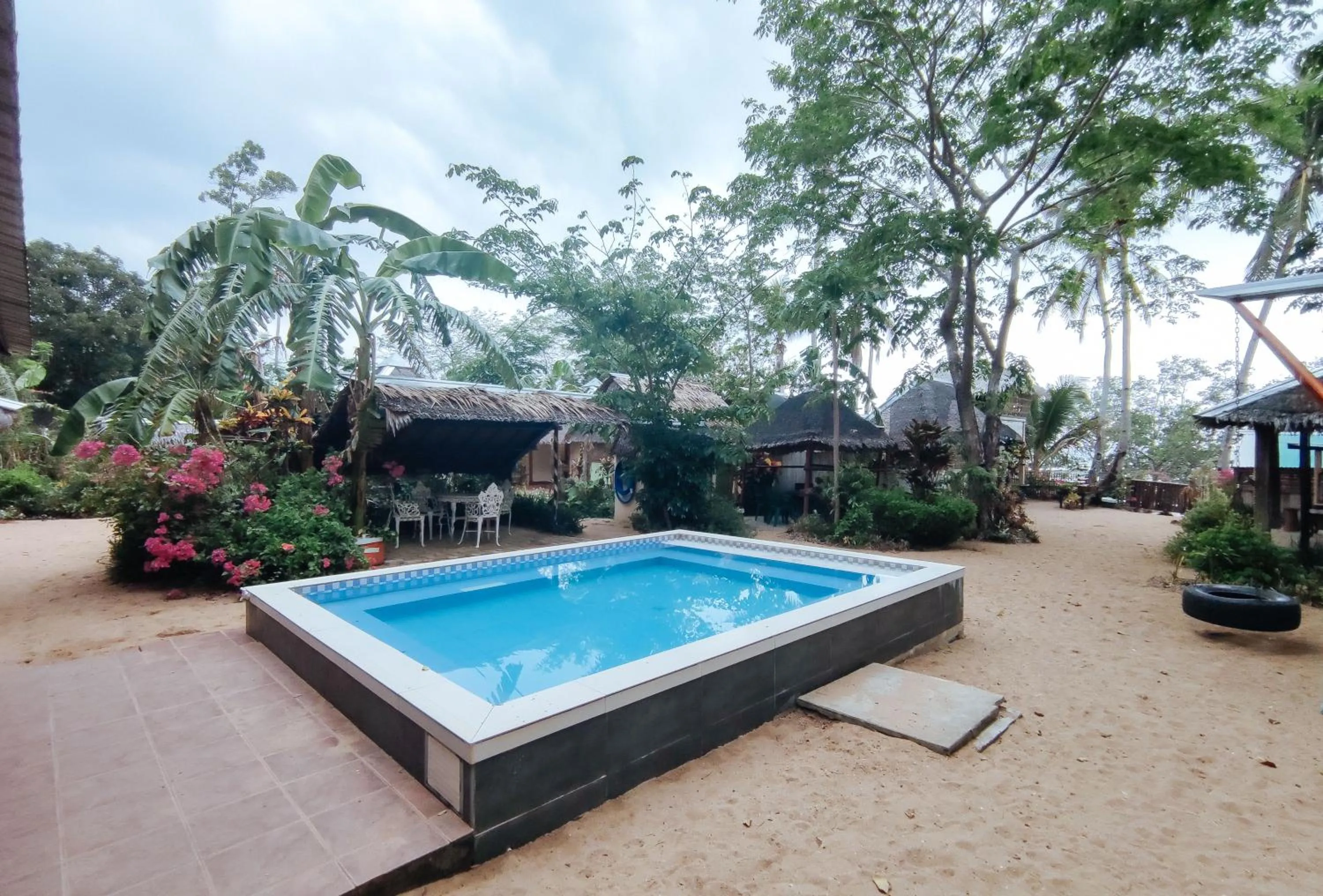Swimming pool in The Clara Beach and Guest House