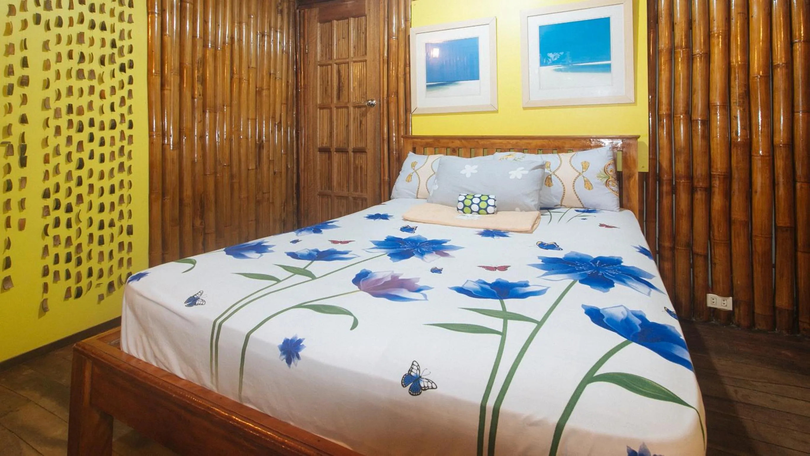 Bed in The Clara Beach and Guest House