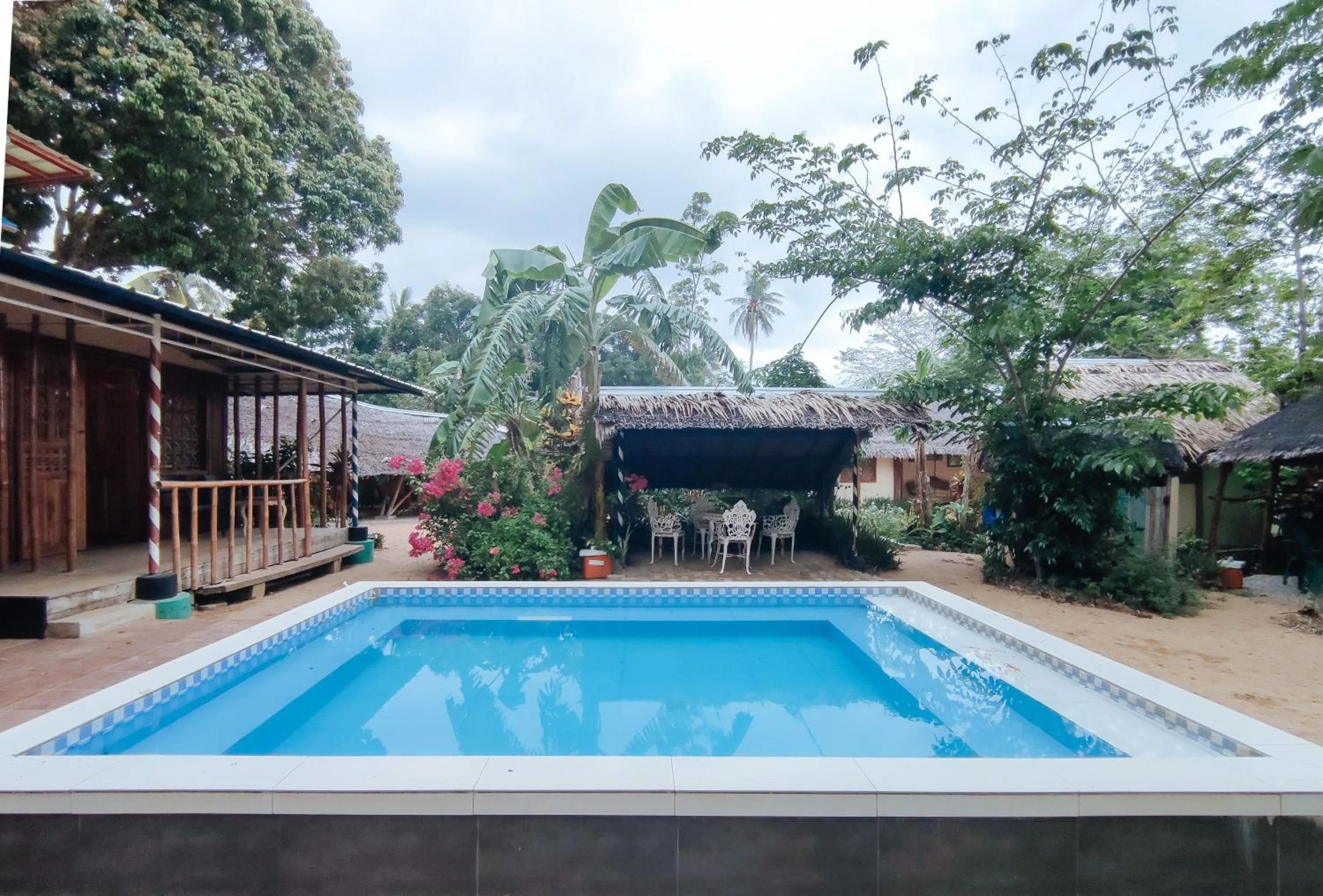 Swimming pool in The Clara Beach and Guest House