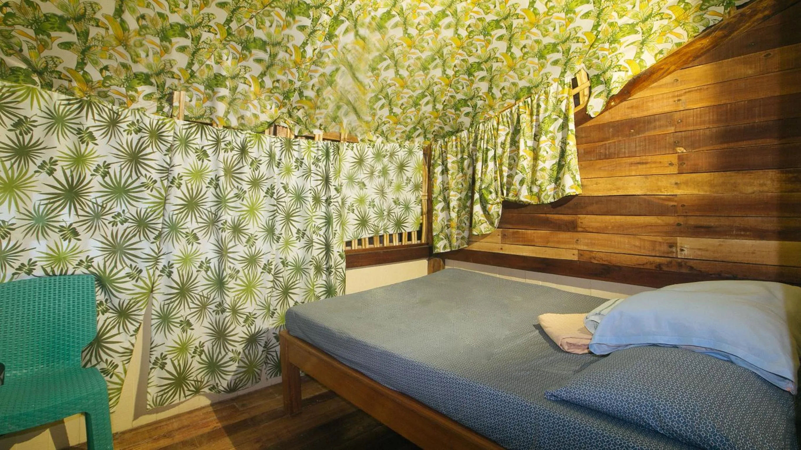 Bed in The Clara Beach and Guest House