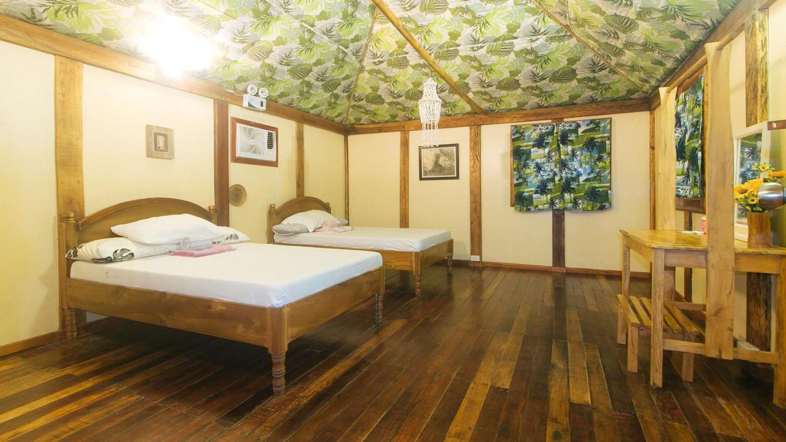 Bed in The Clara Beach and Guest House