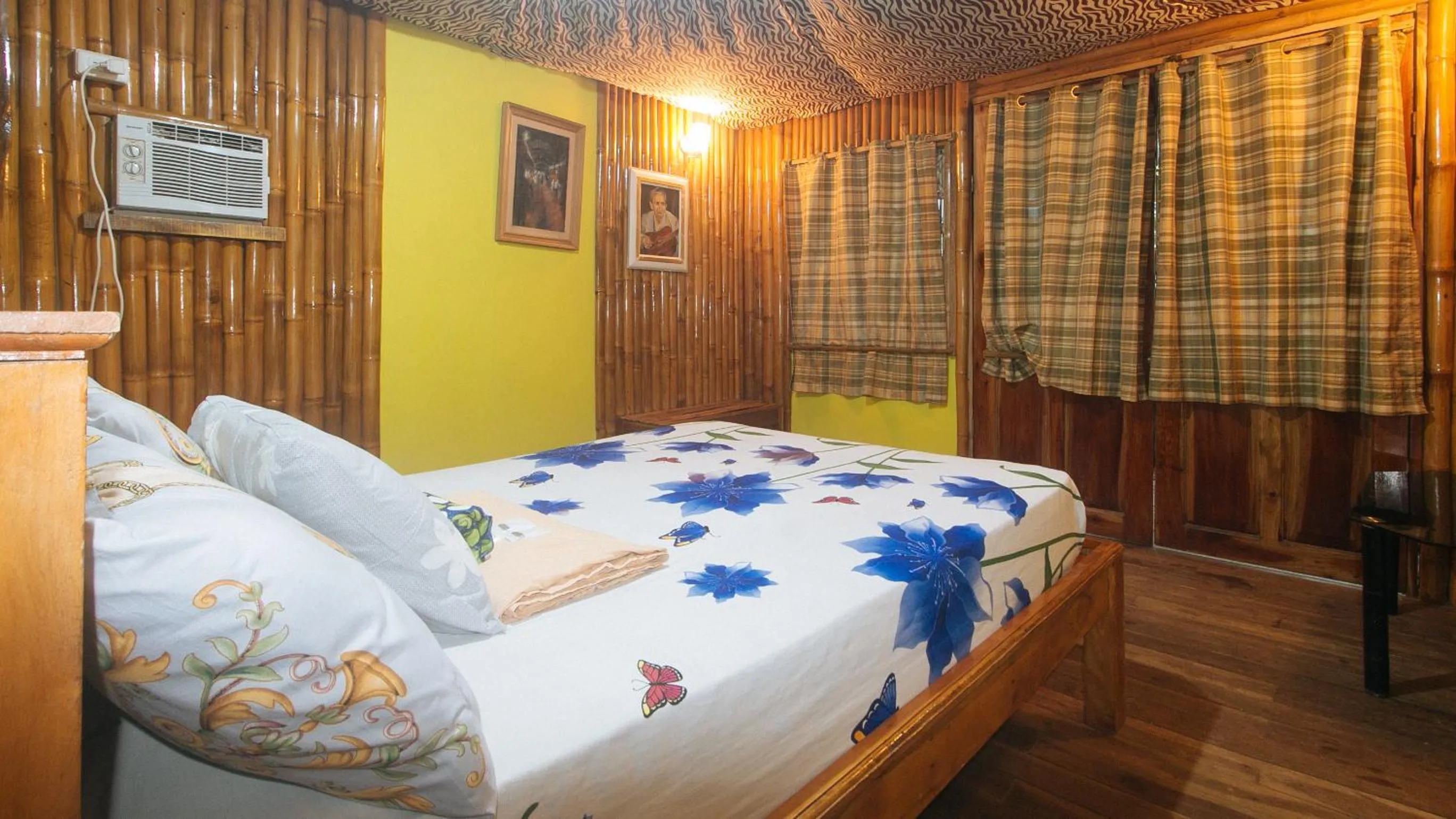 Bed in The Clara Beach and Guest House