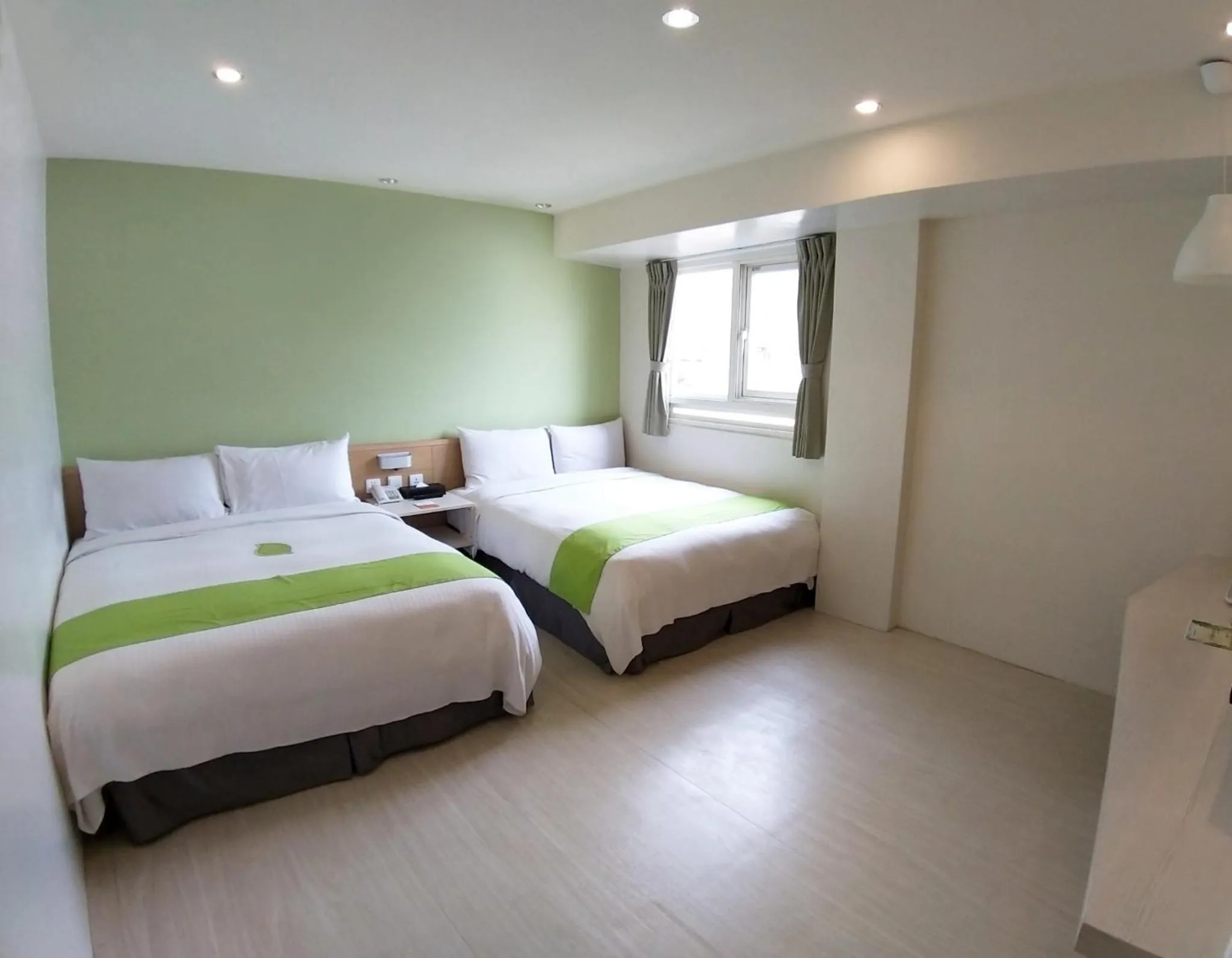 Bed in Green Hotel - Fengjia
