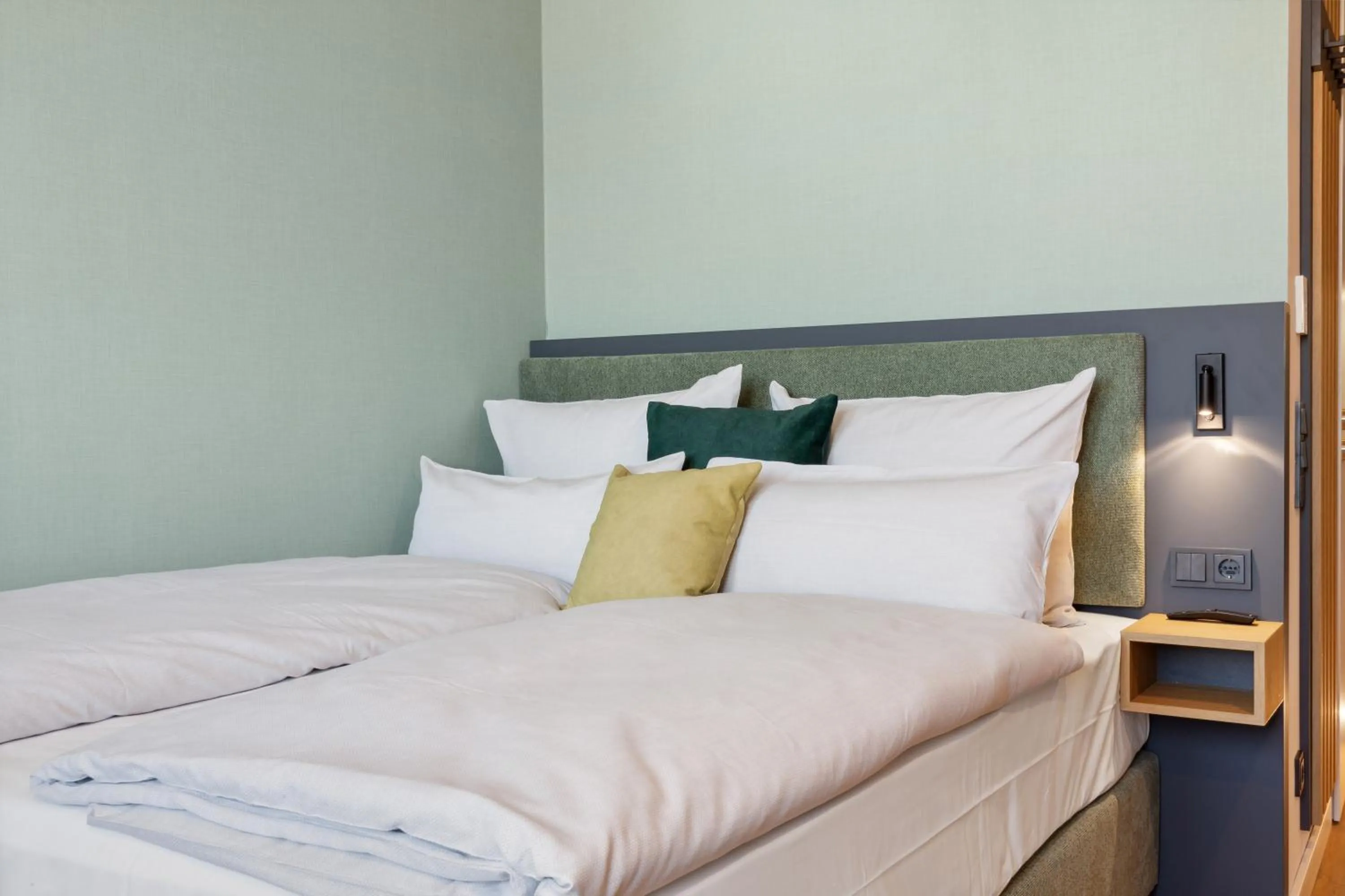 Bed in Nena Apartments München City