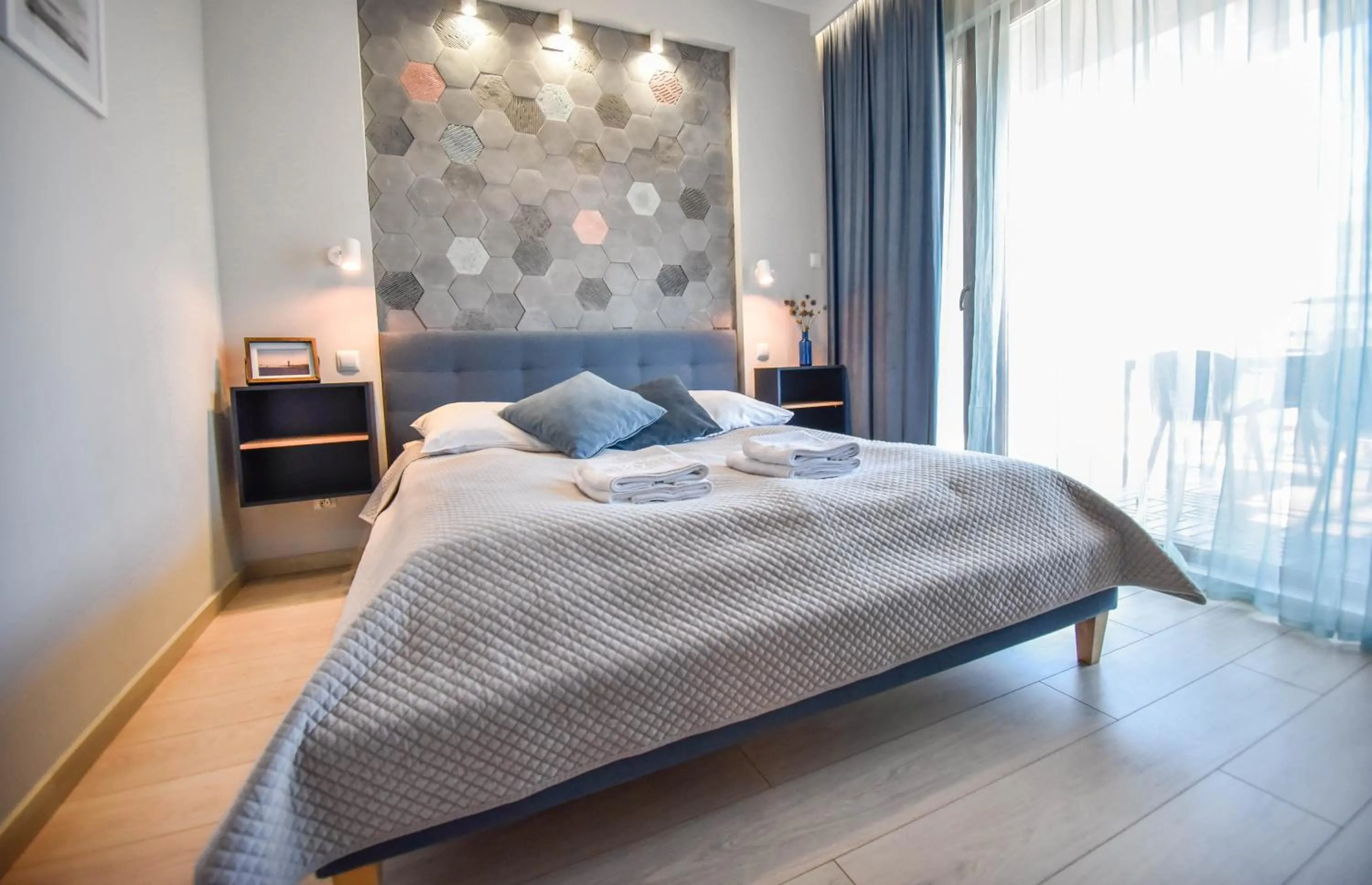 Bed in Apartamenty Na Wyspie - Baltic Park - Apartamenty z sypialnią i parkingiem - ul Uzdrowiskowa 24-34