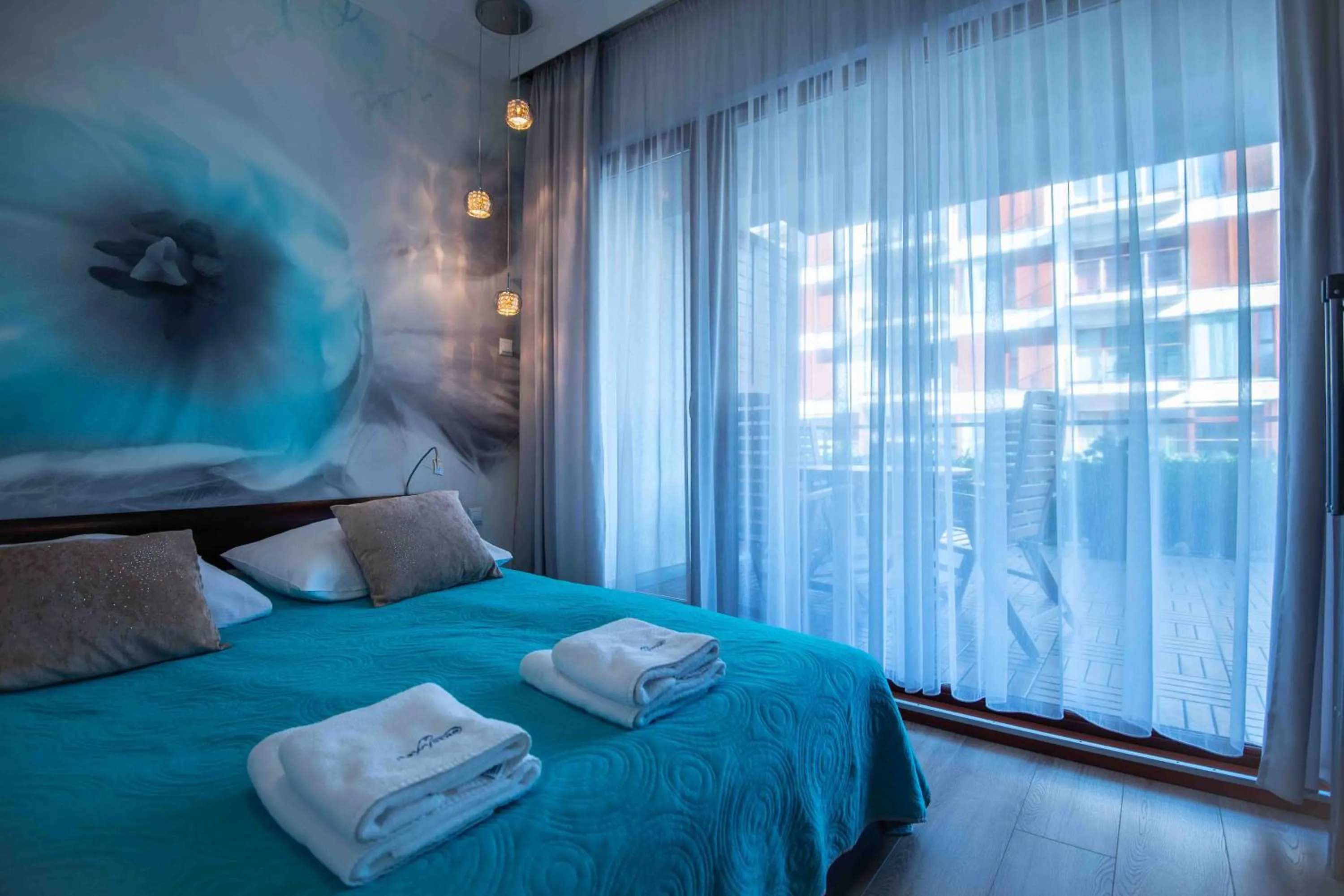 Bed in Apartamenty Na Wyspie - Baltic Park - Apartamenty z sypialnią i parkingiem - ul Uzdrowiskowa 24-34
