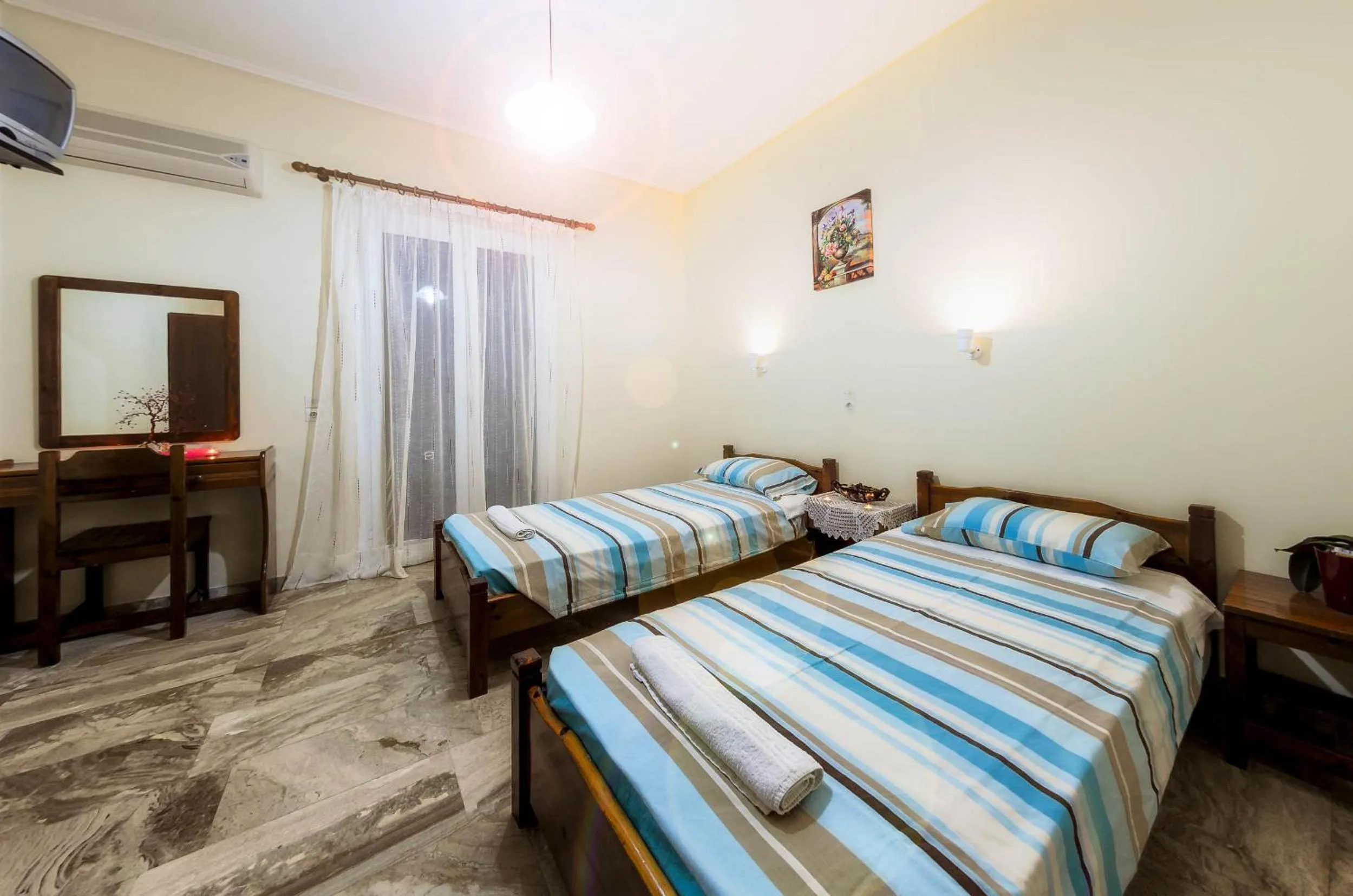 Bed in Borsalino Studios & Apartments