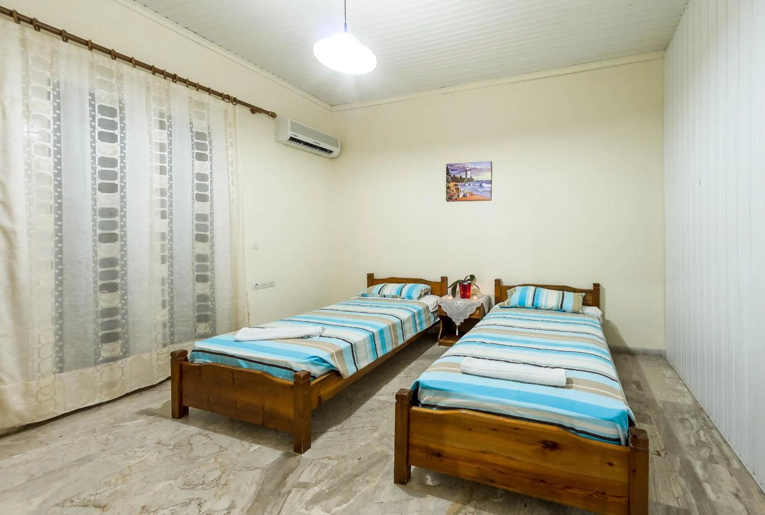 Bed in Borsalino Studios & Apartments