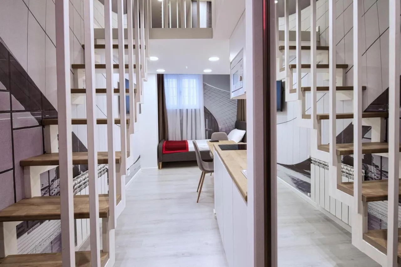 Seating area, Bed in R Studios Old Baku