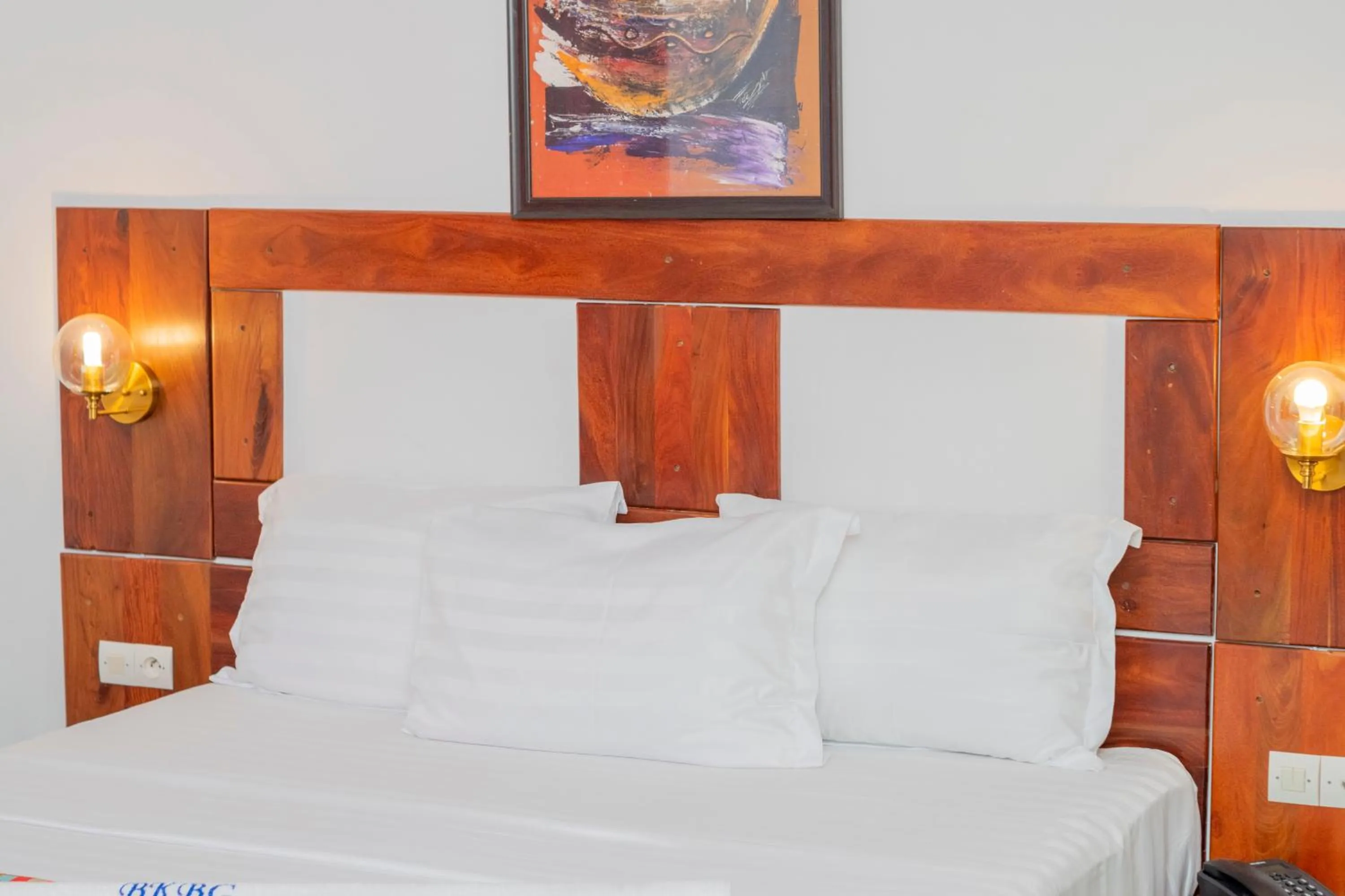 Bed in Hotel BKBG Benin