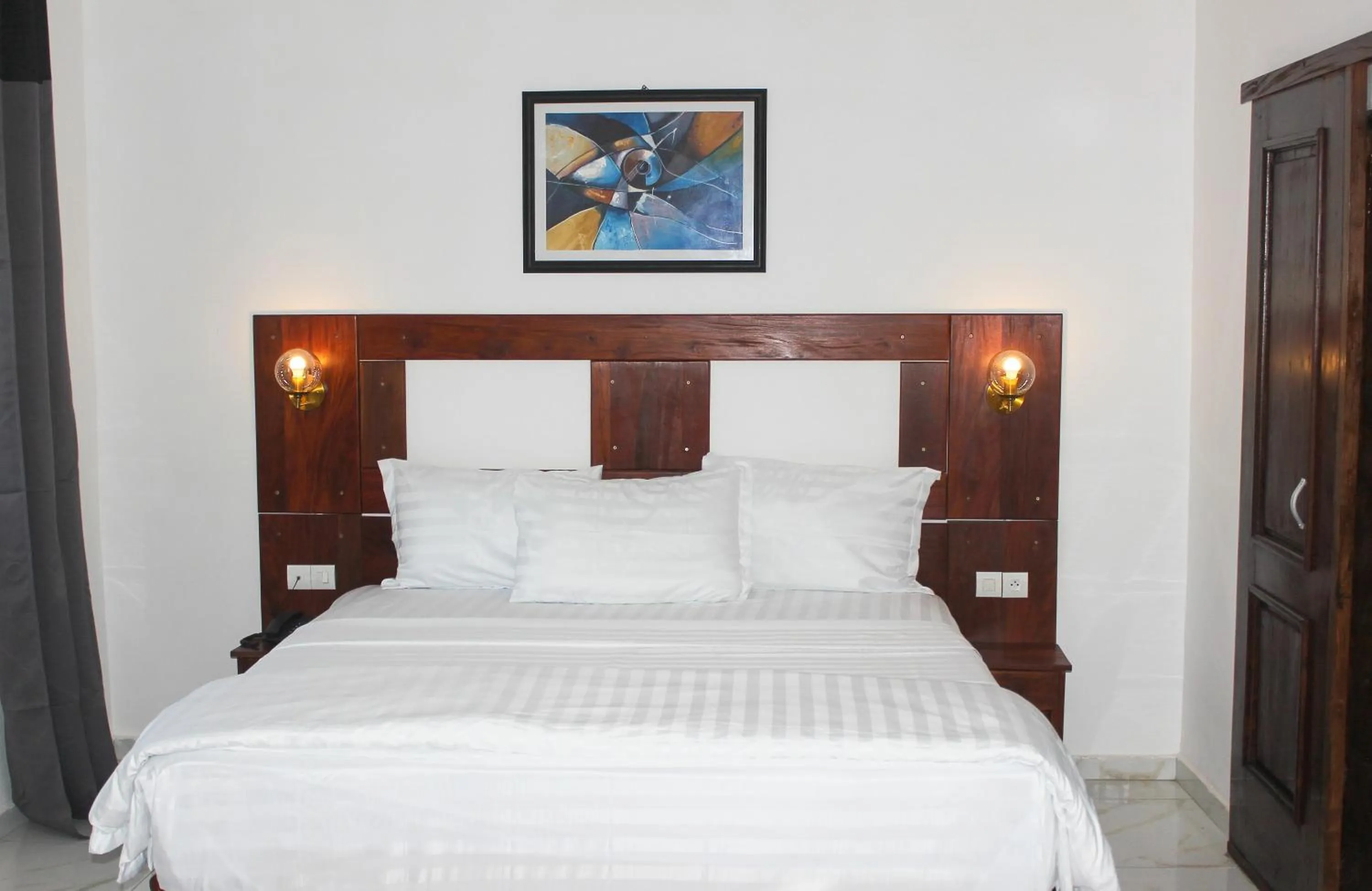Bed in Hotel BKBG Benin