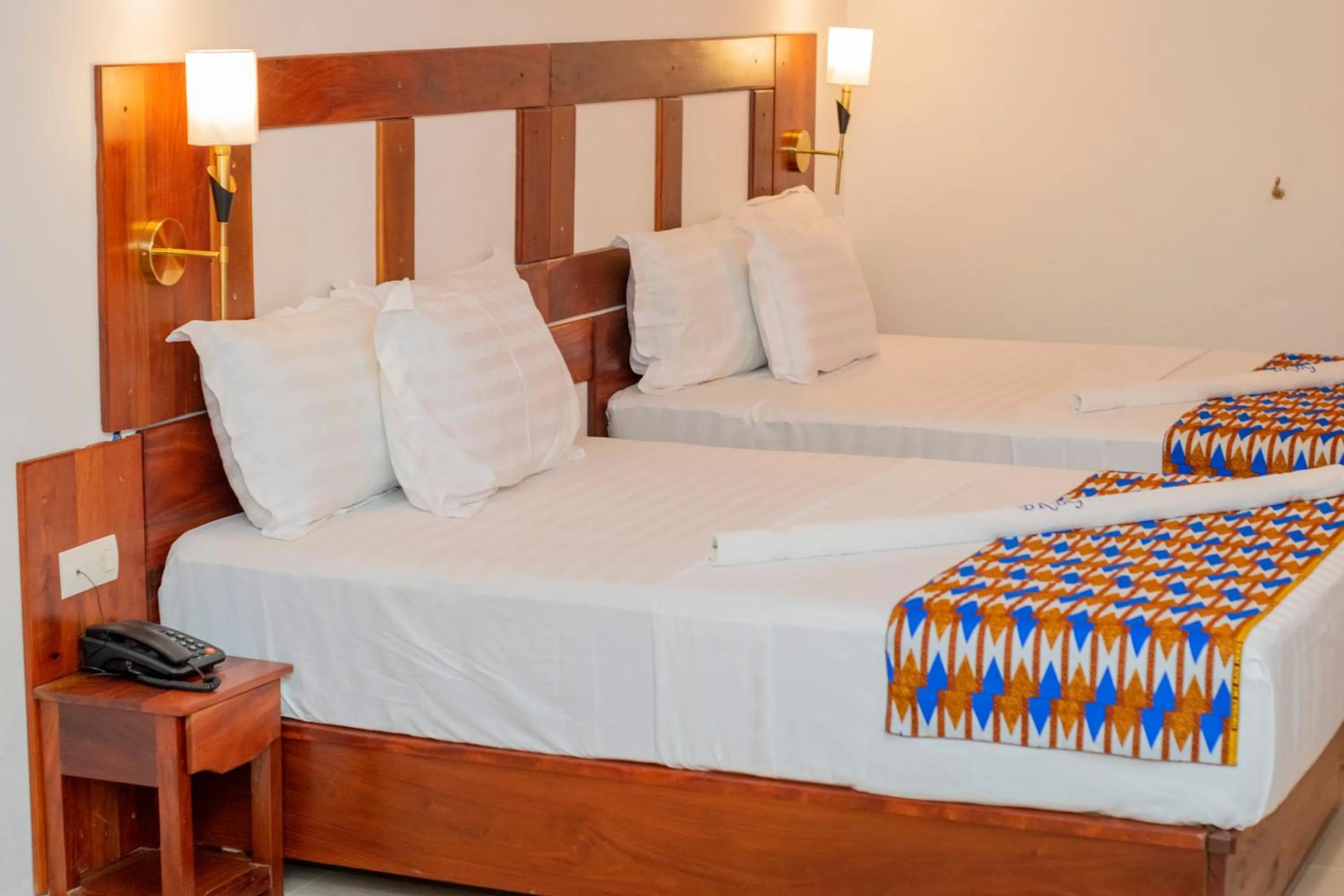 Bed in Hotel BKBG Benin