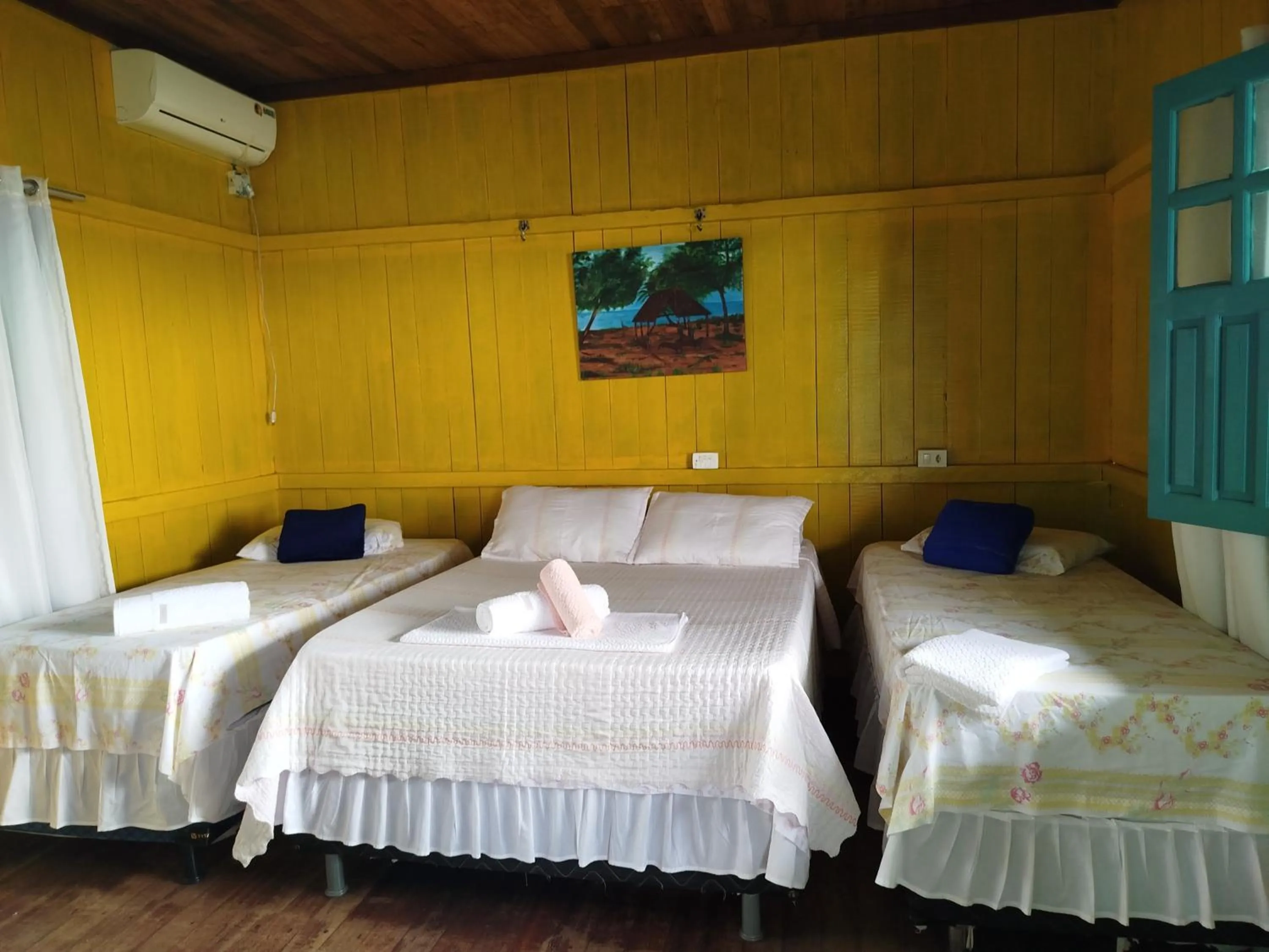 Bed in Pousada Bosque dos Aruãs