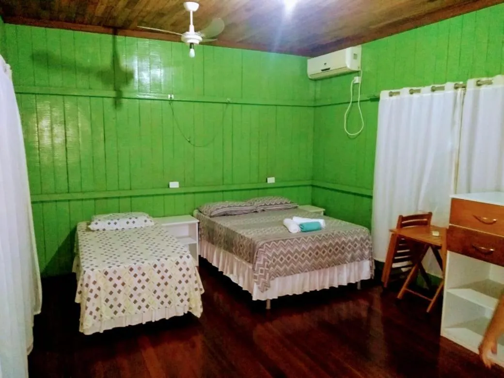 Photo of the whole room, Bed in Pousada Bosque dos Aruãs
