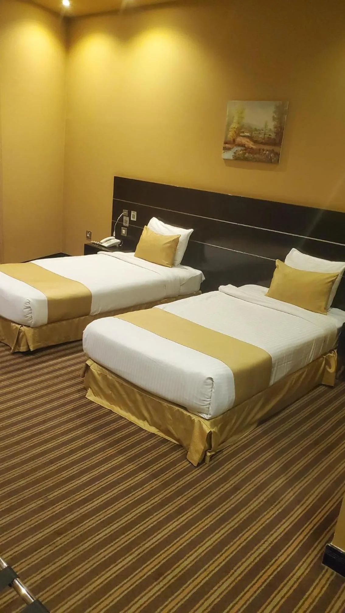 Bed in Aldar Hotel