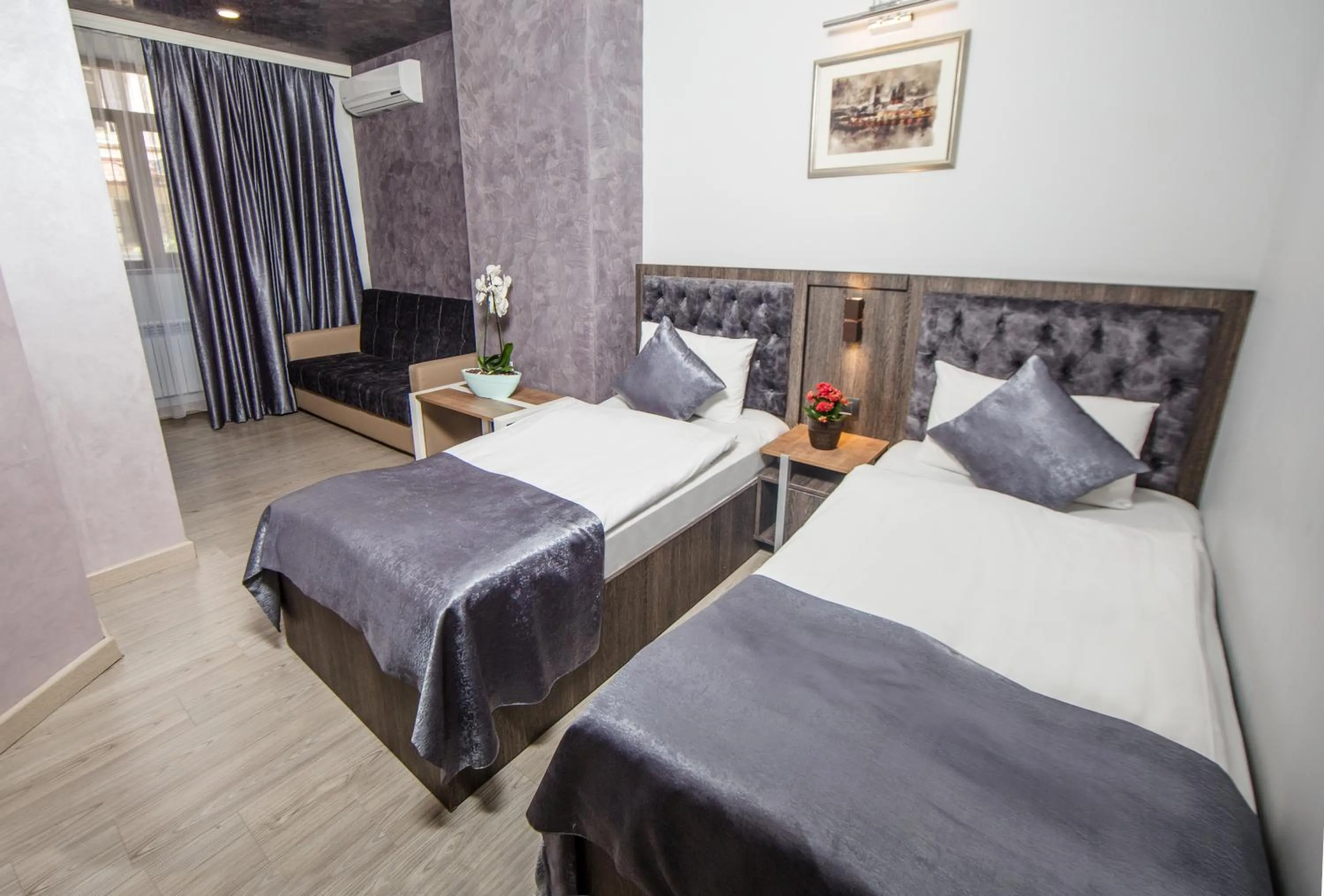 Photo of the whole room, Bed in Passage Modern Hotel