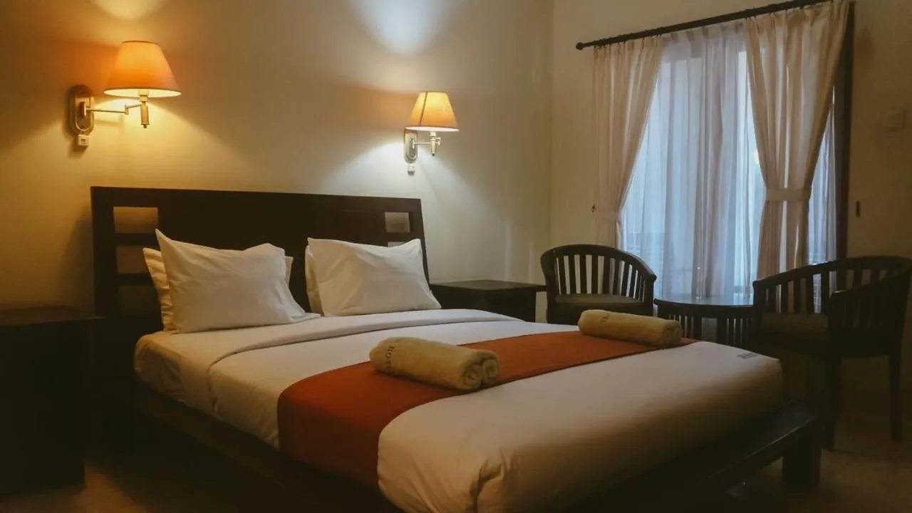 Bed in New Puri Asih Hotel