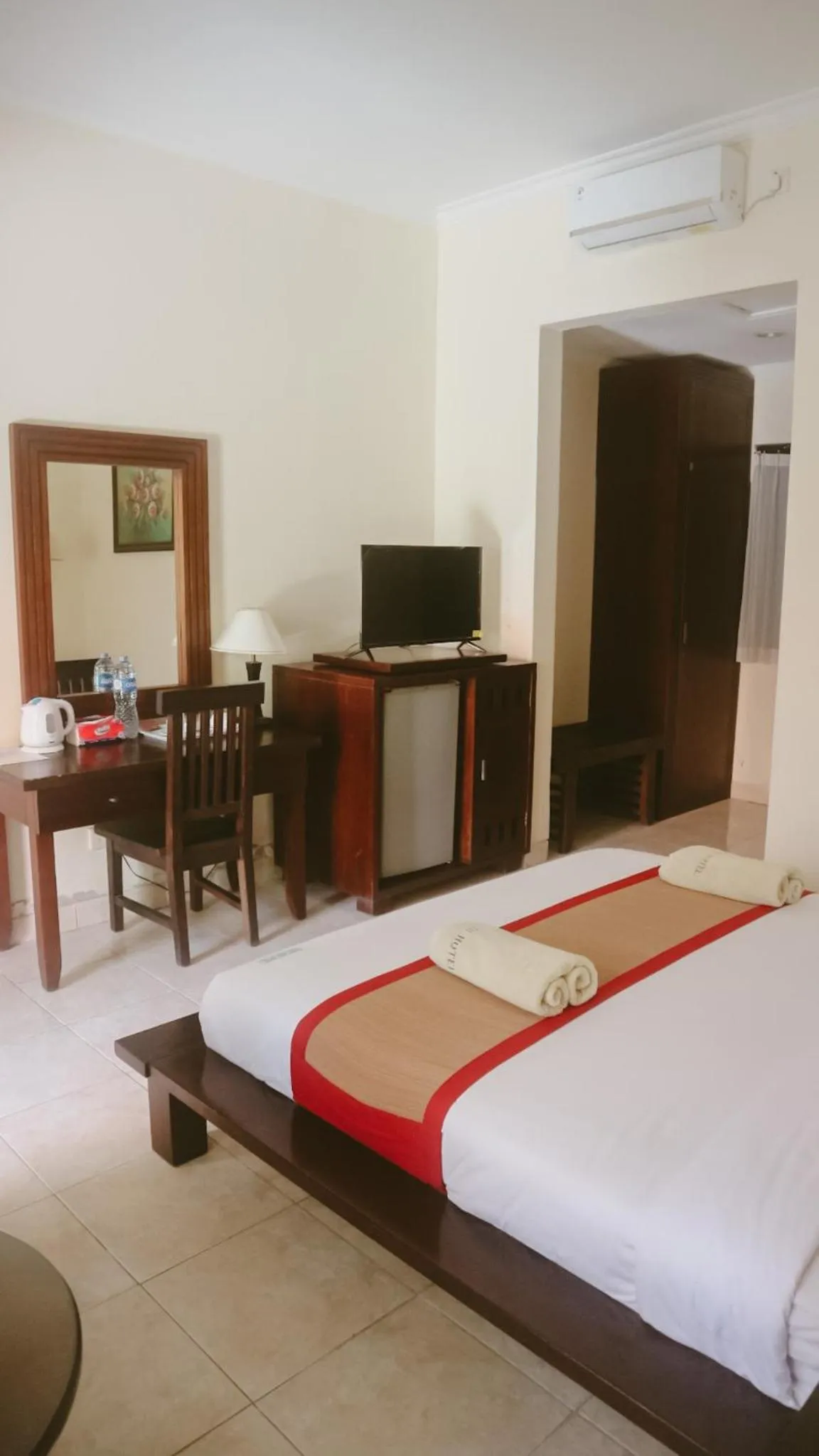 Bed in New Puri Asih Hotel