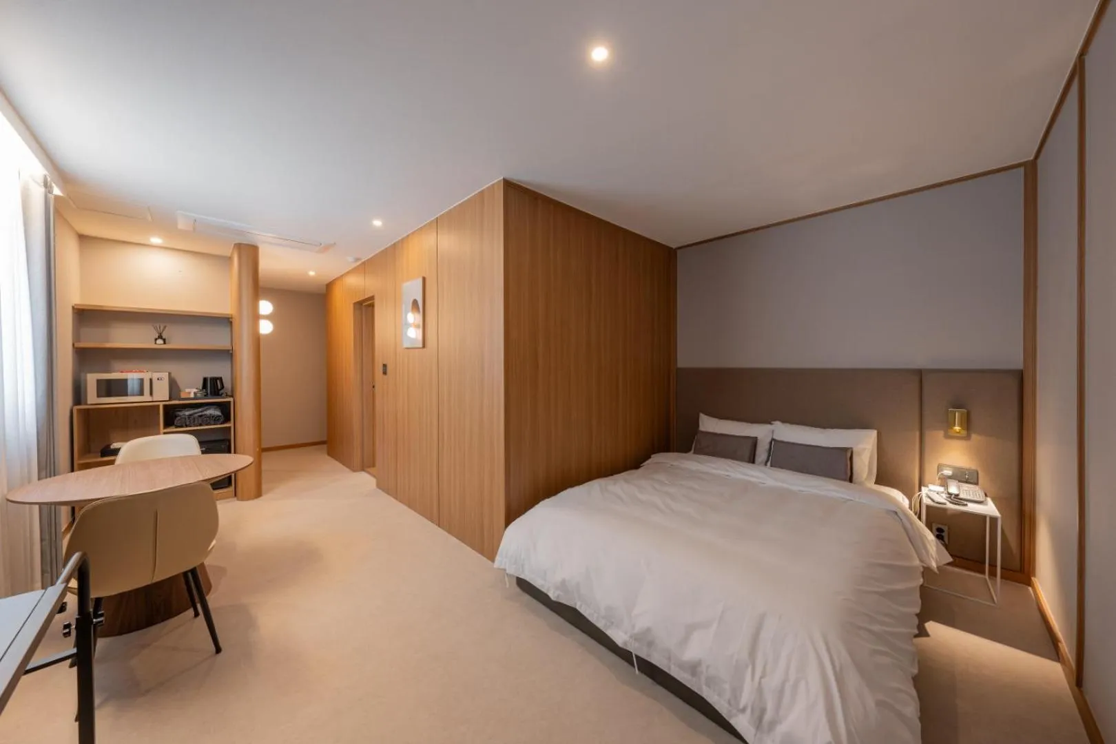 Seating area, Bed in H-avenue Hotel Munhyeon