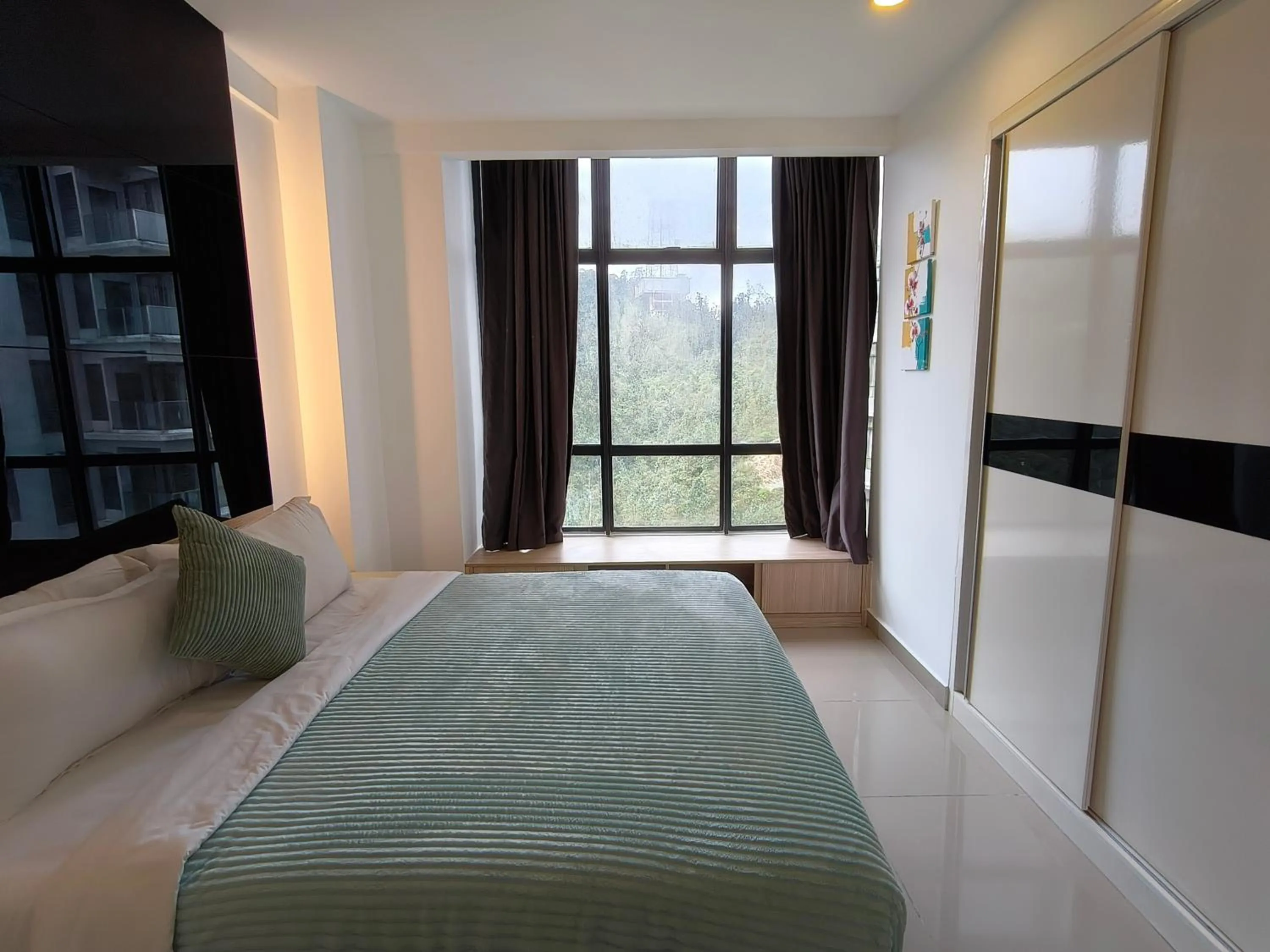 Bed in Emerald Homes Cozy Homestay at Ion Delemen Genting Highlands
