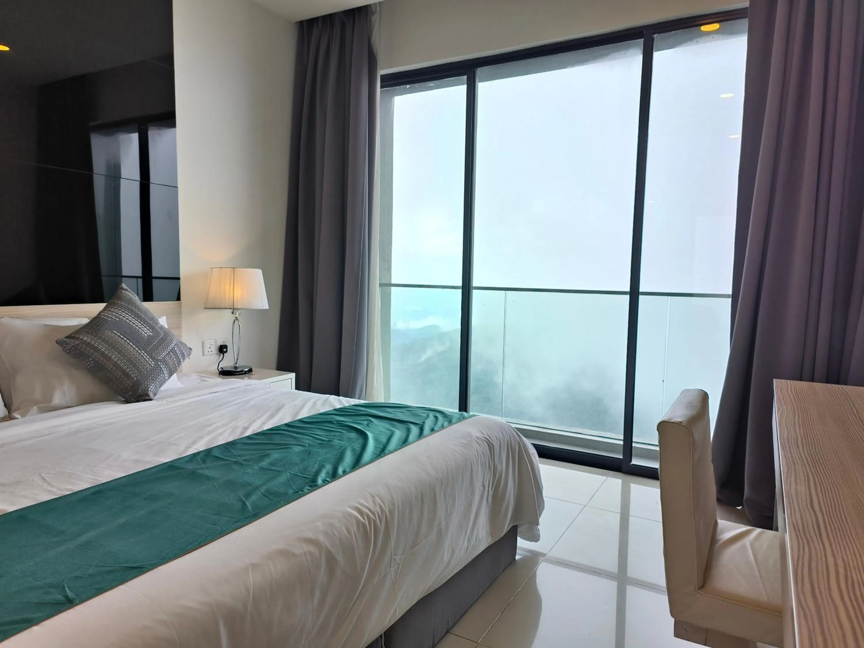 Bed in Emerald Homes Cozy Homestay at Ion Delemen Genting Highlands