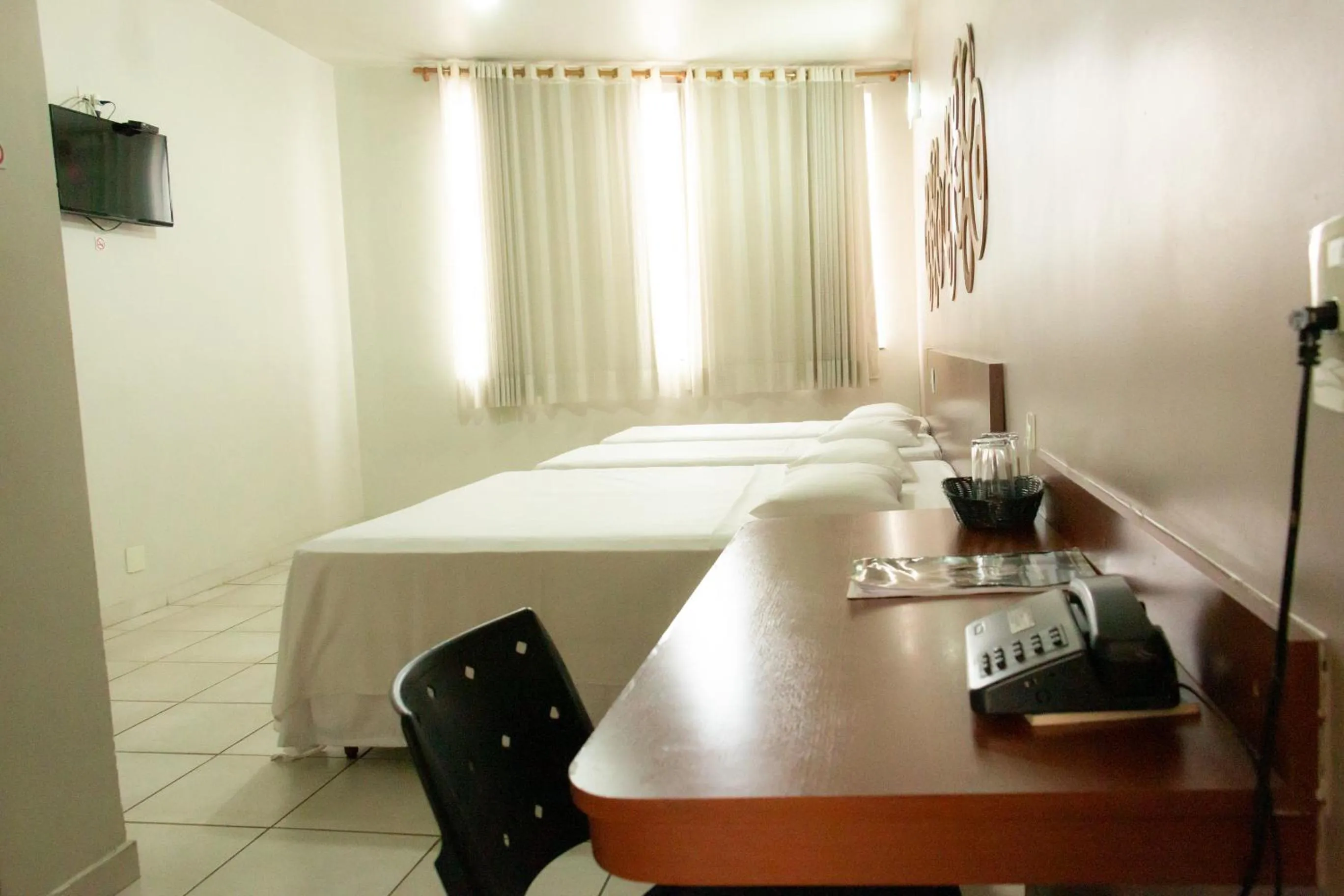 TV and multimedia, Bed in Contagem Centro Hotel