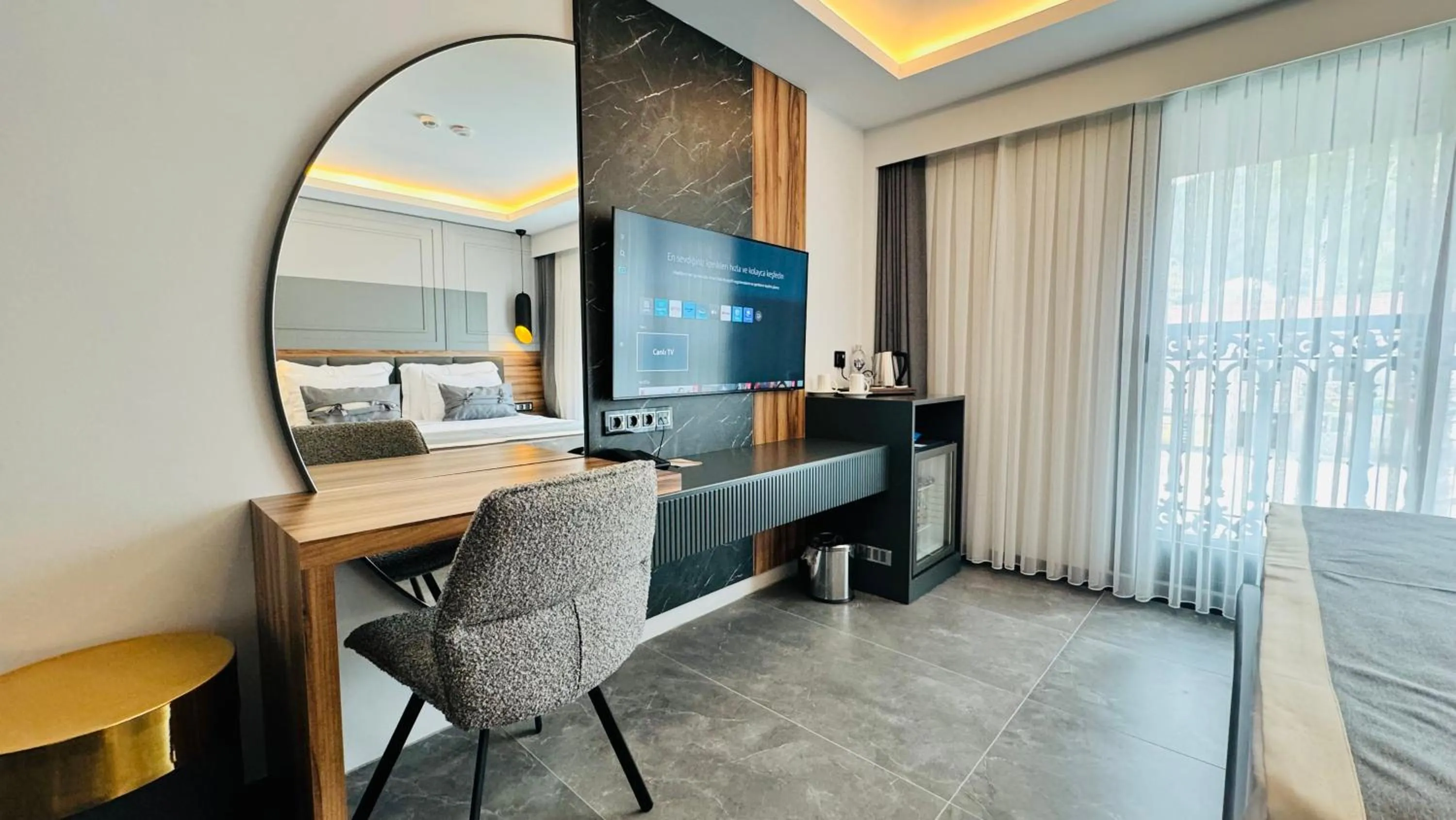 TV and multimedia, Bed in TELMESSOS CİTY HOTEL- Adults Only