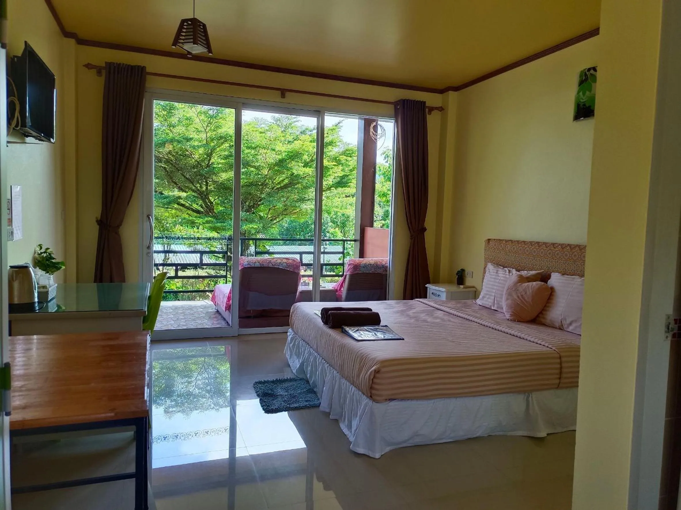 View (from property/room), Bed in Khao Sok Country Resort
