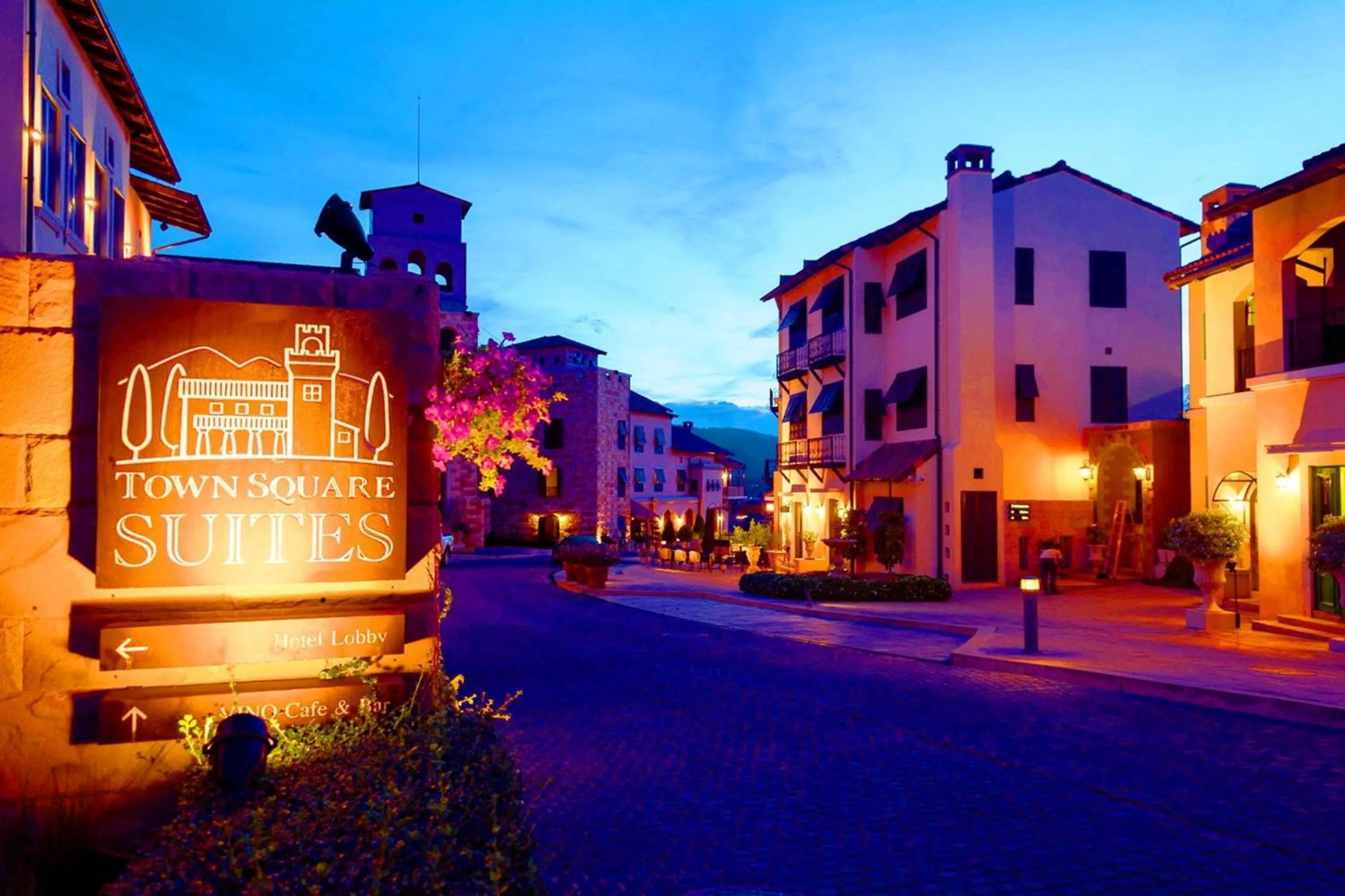 Property logo or sign in Toscana Town Square Suites