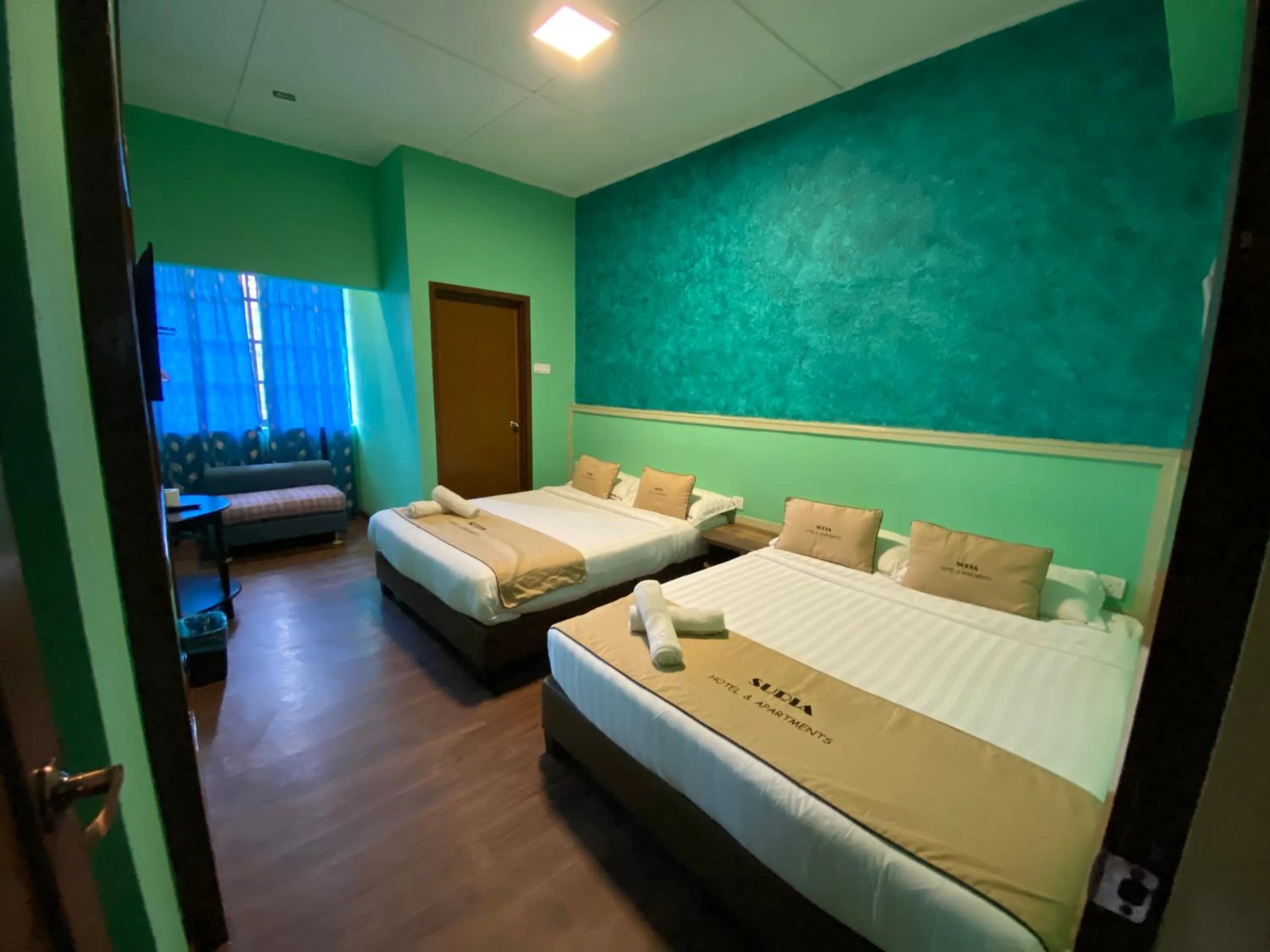 Bed in Suria Cameron Hotel