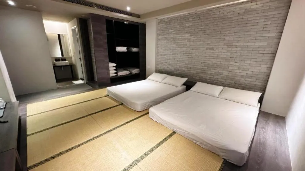 Photo of the whole room, Bed in Kiwi Express Hotel-Taichung Station II