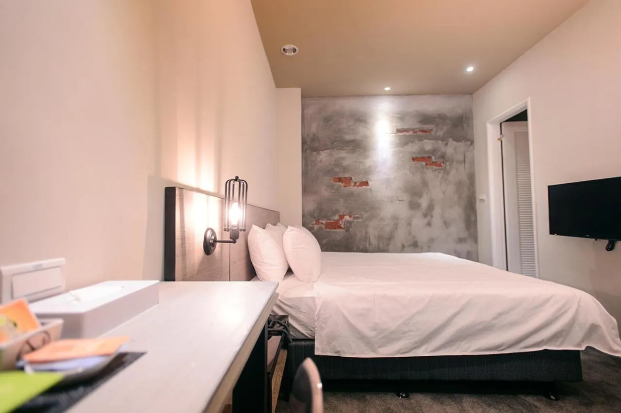 Photo of the whole room, Bed in Kiwi Express Hotel-Taichung Station II