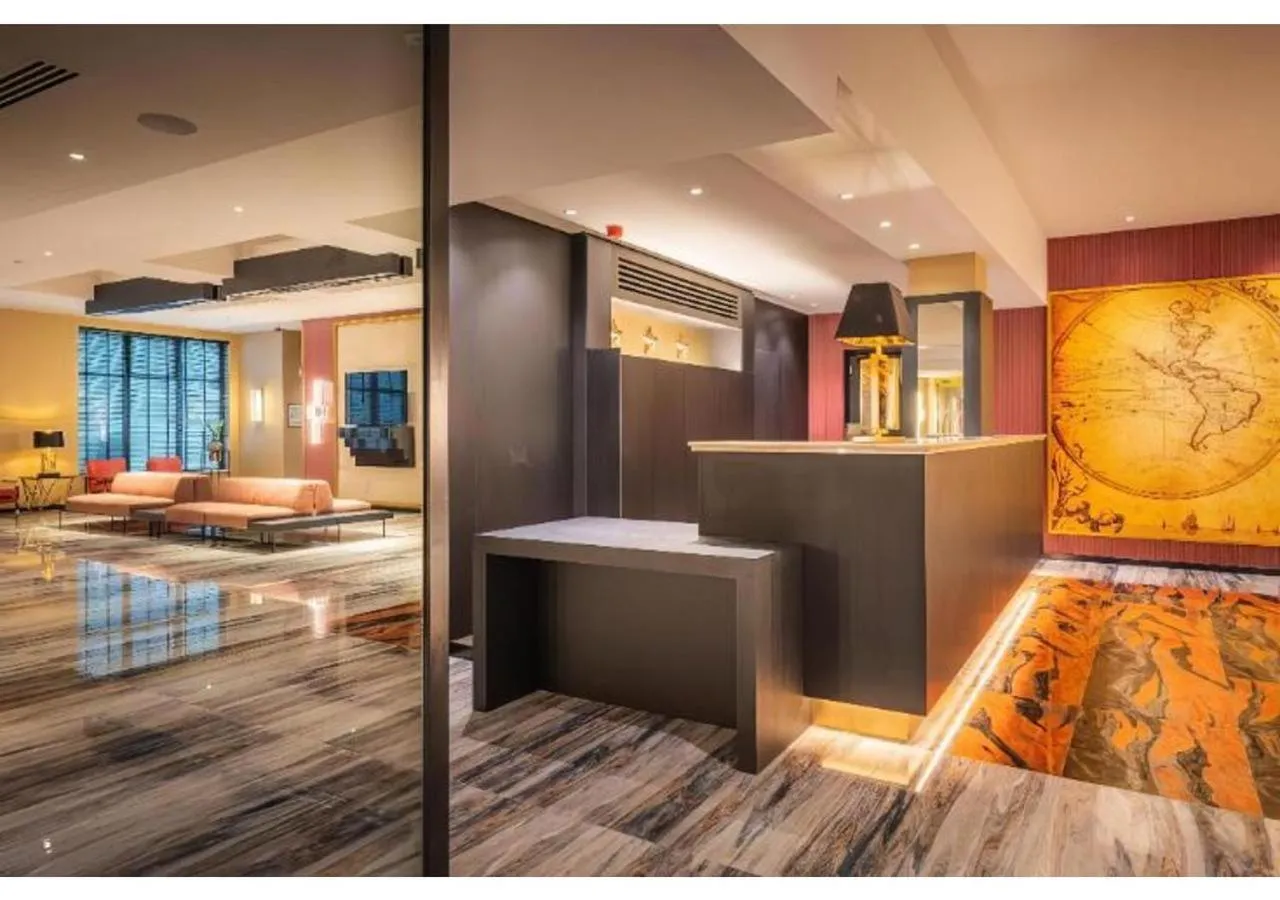 Living room, Bed in Hotel Jamingo