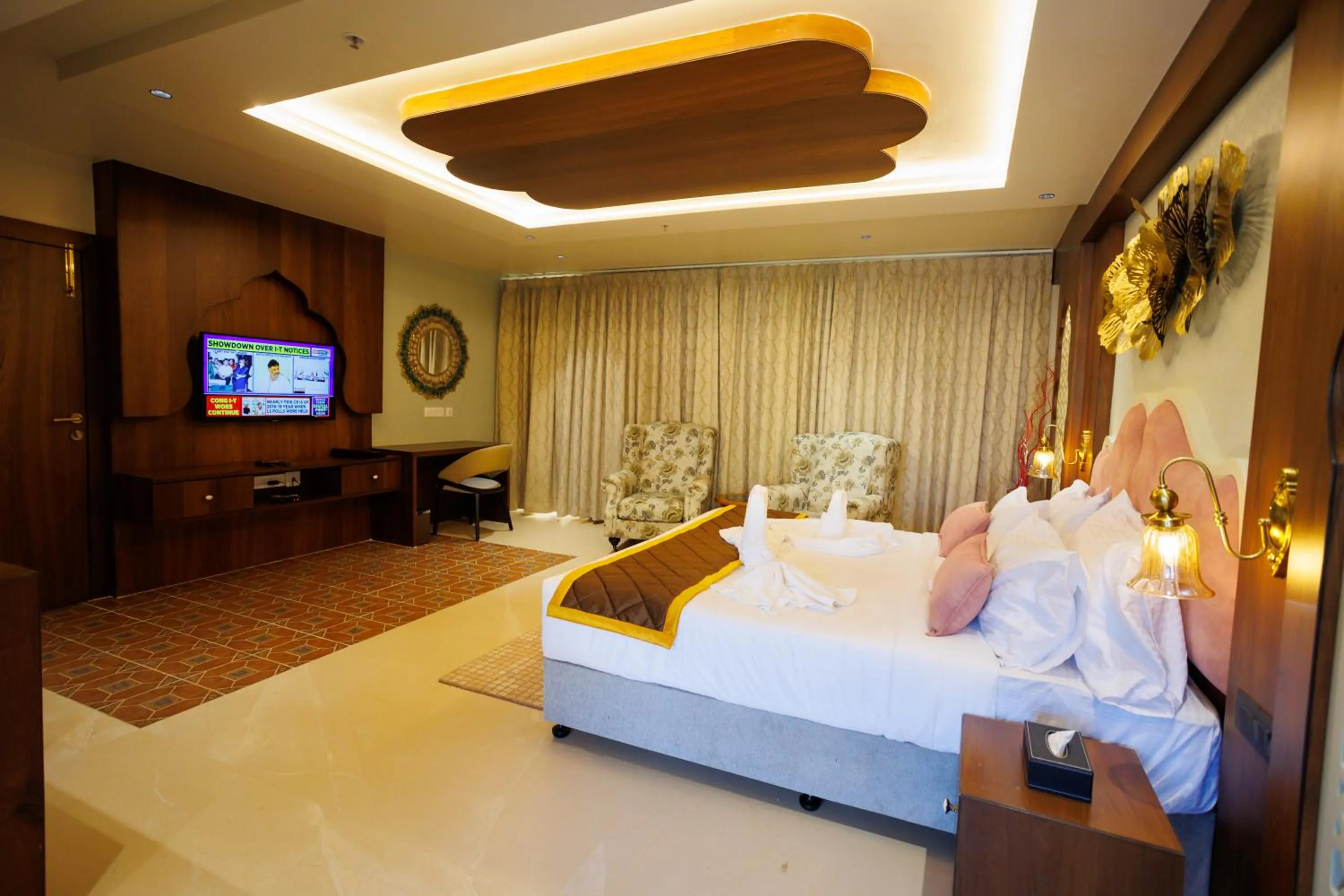 Bed in AJ GRAND ELITE HOTEL