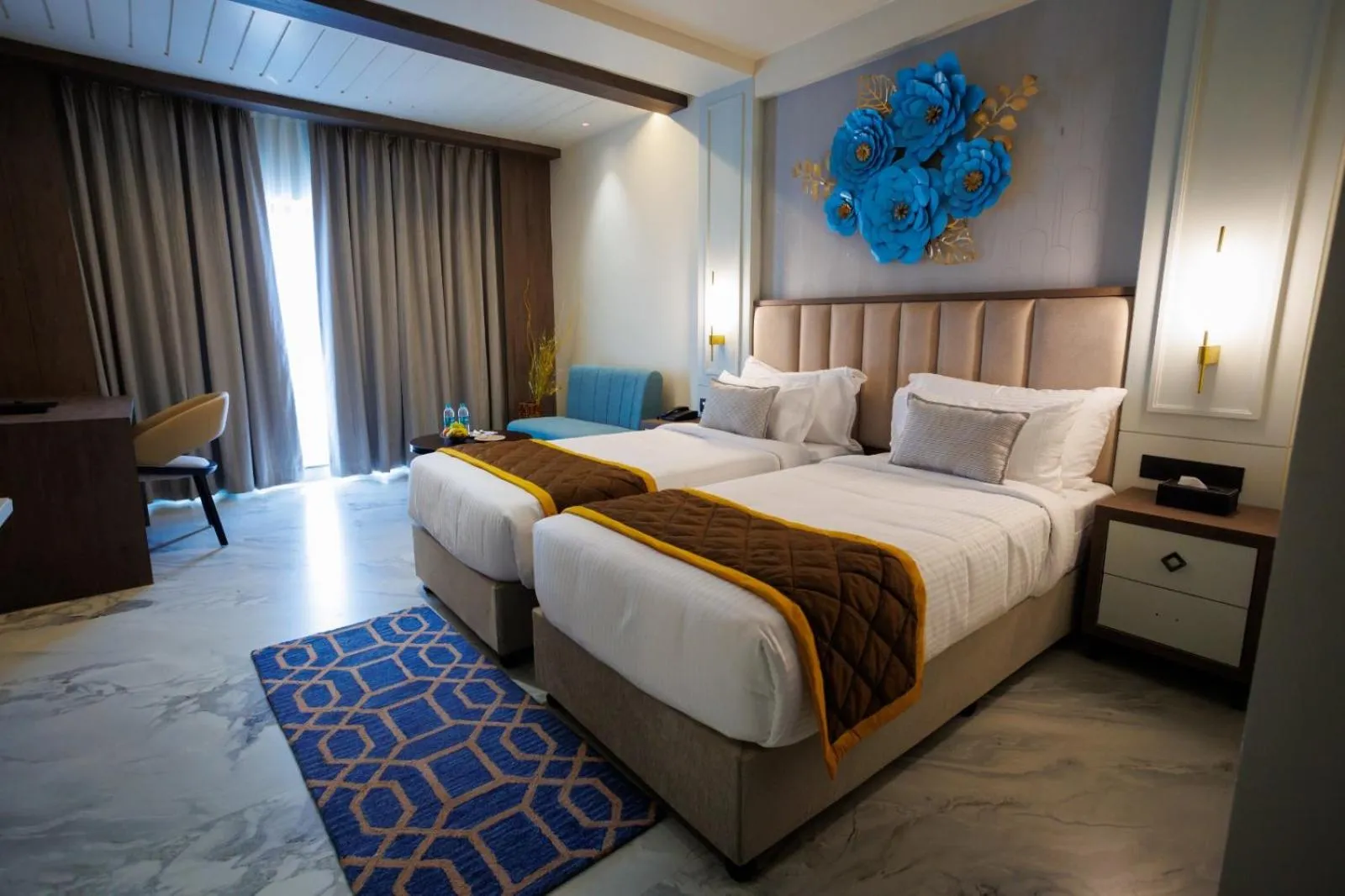 Bed in AJ GRAND ELITE HOTEL