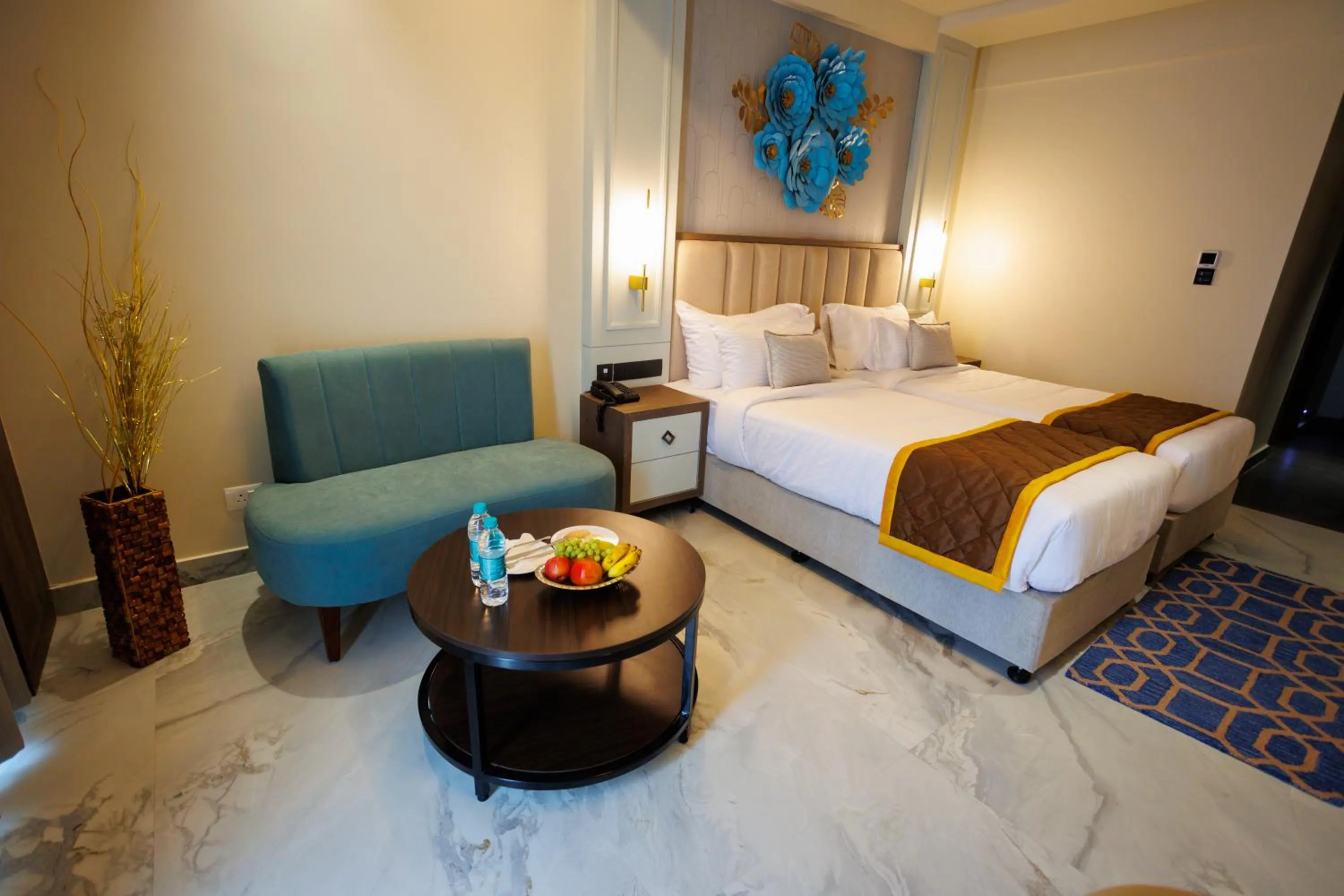 Bed in AJ GRAND ELITE HOTEL