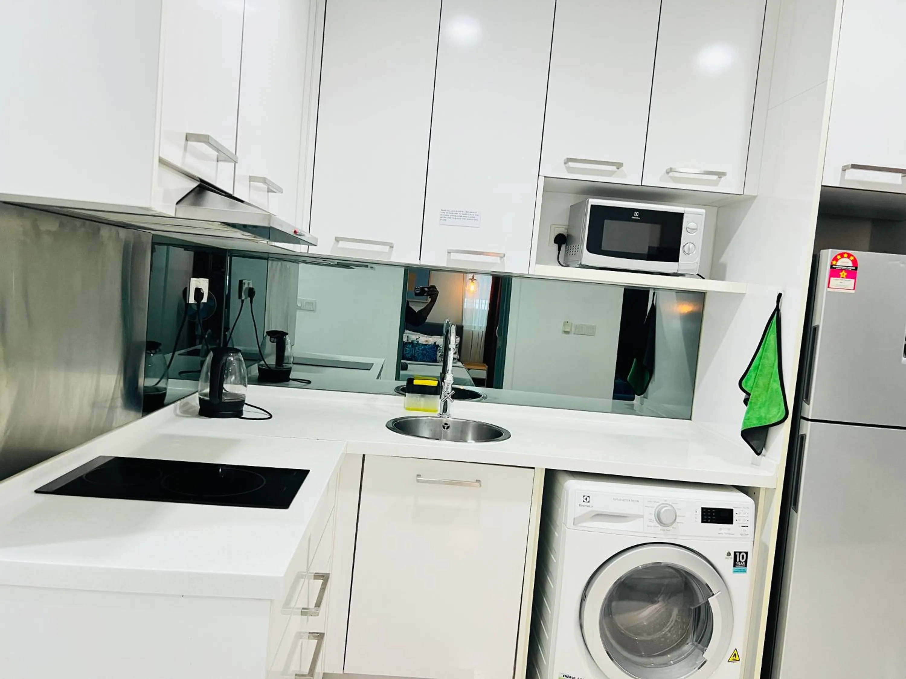 Kitchen or kitchenette in Mercu Summer Suites KLCC By Sweet Home