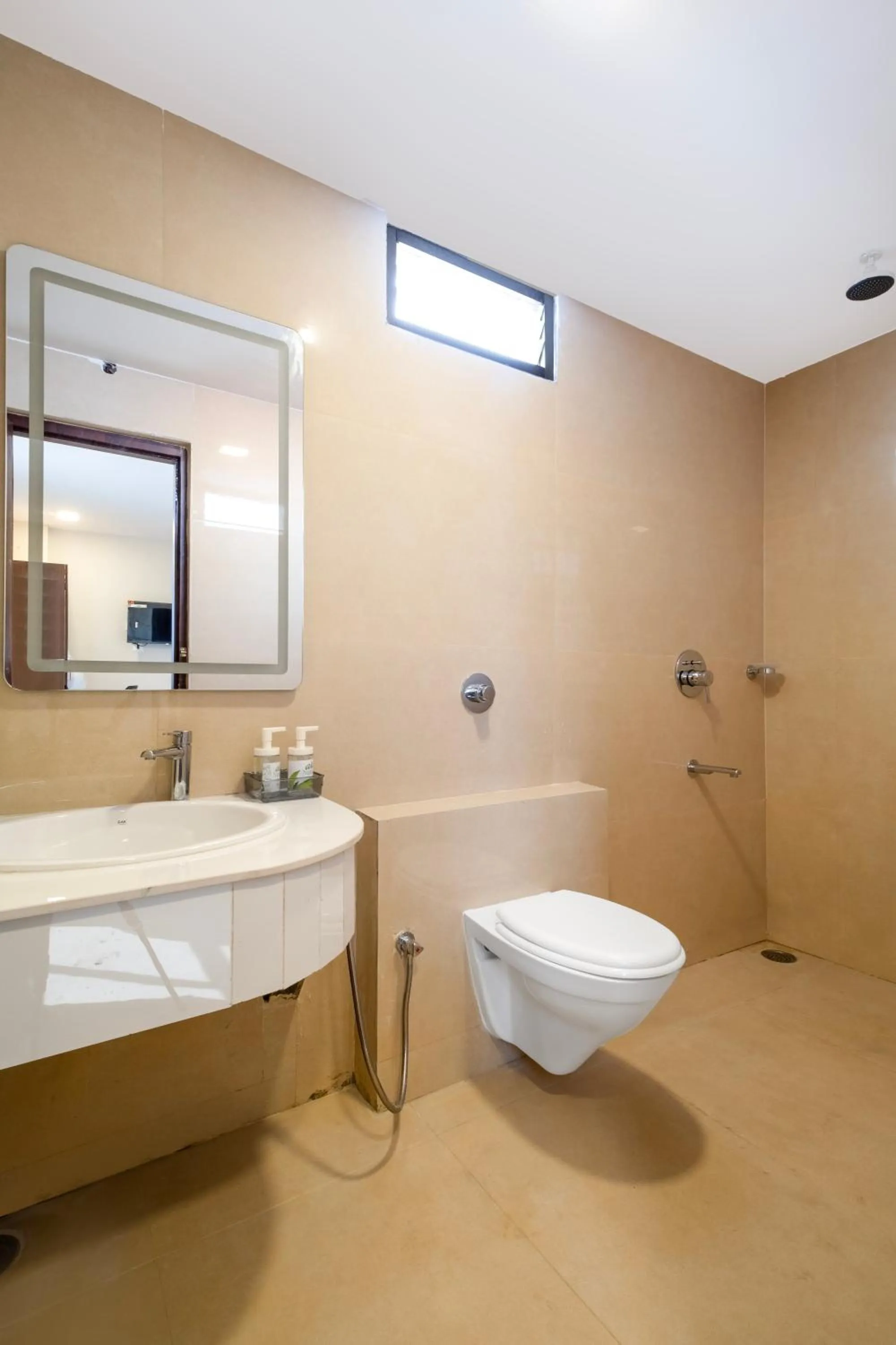 Bathroom in Monday Hotels Swarnas The Capital