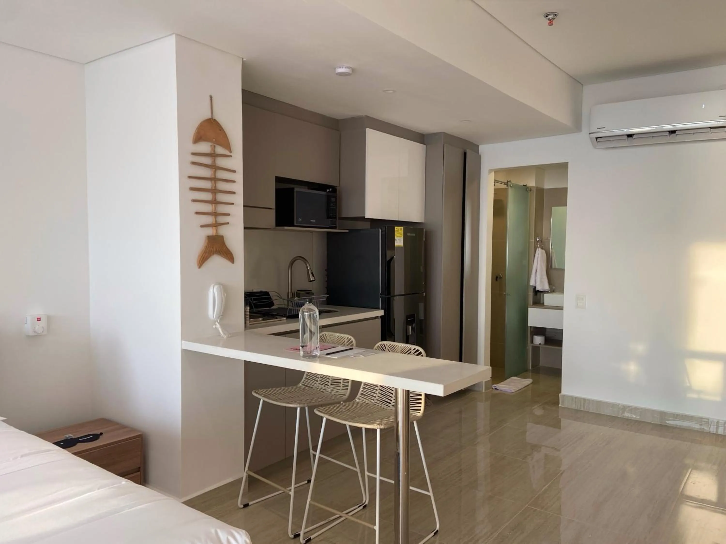 Kitchen or kitchenette, Bed in Wynwood Cartagena Beach